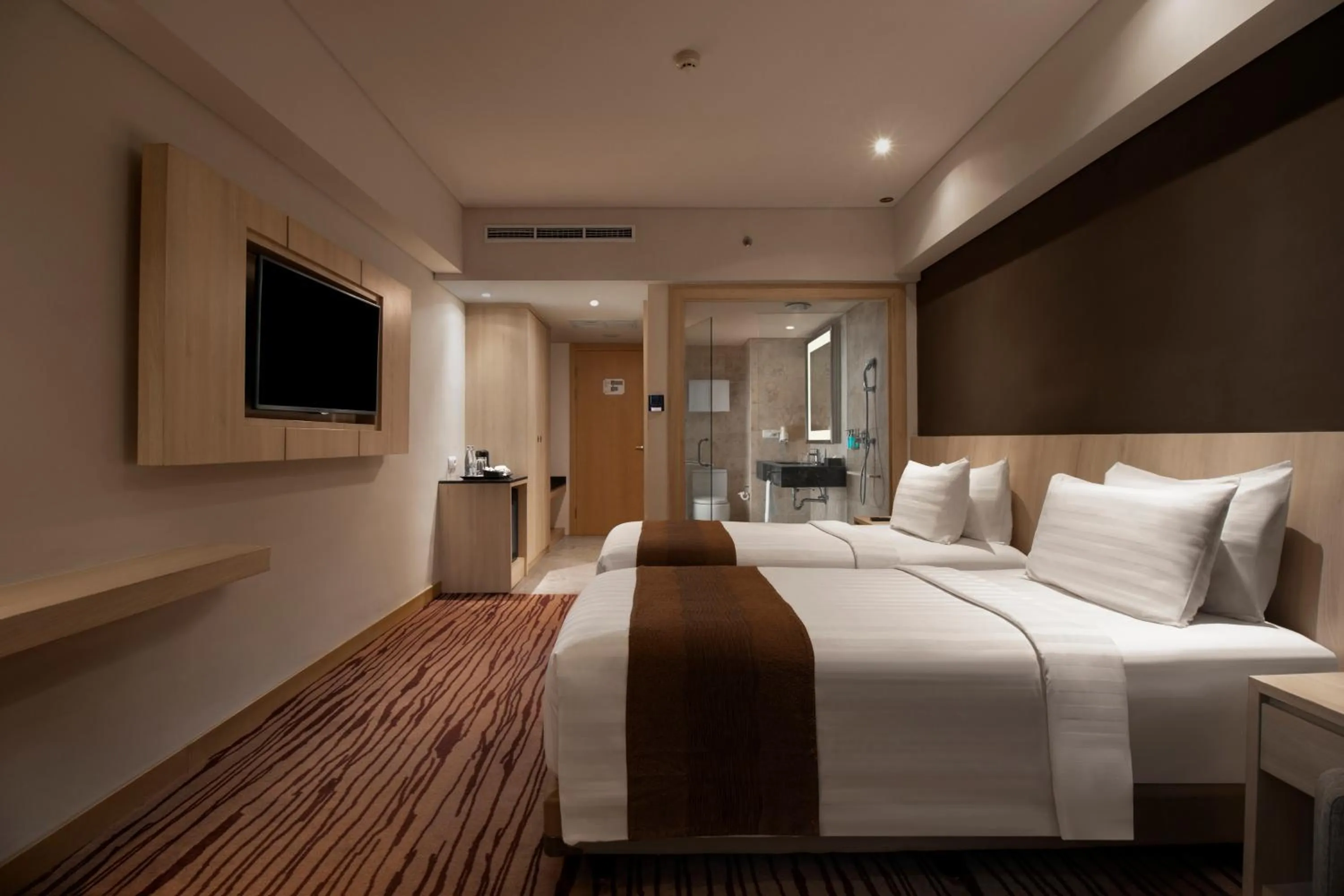 Bed in Sovereign Bali Hotel