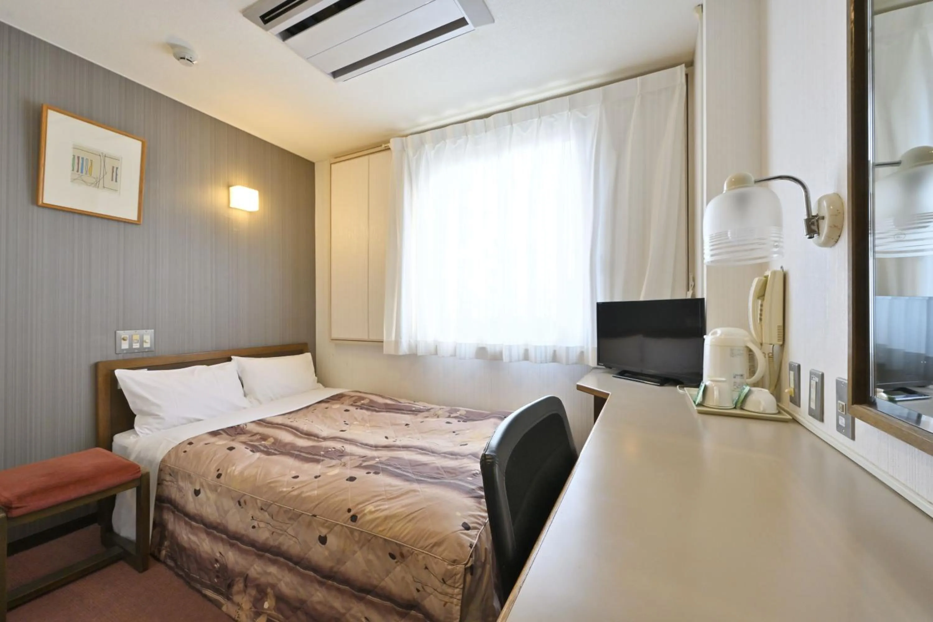 Bed in Wakayama Daiichi Fuji Hotel