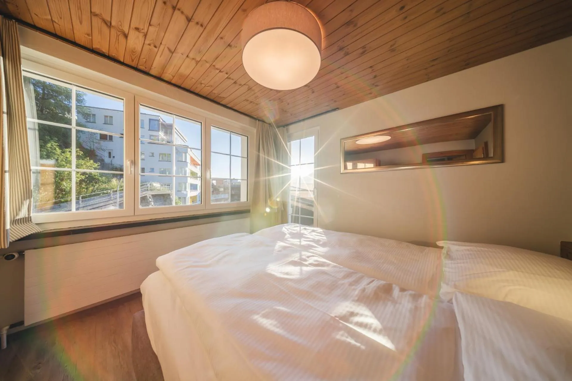 Photo of the whole room, Bed in Hotel Quellenhof - Self Check-in & Adults Only