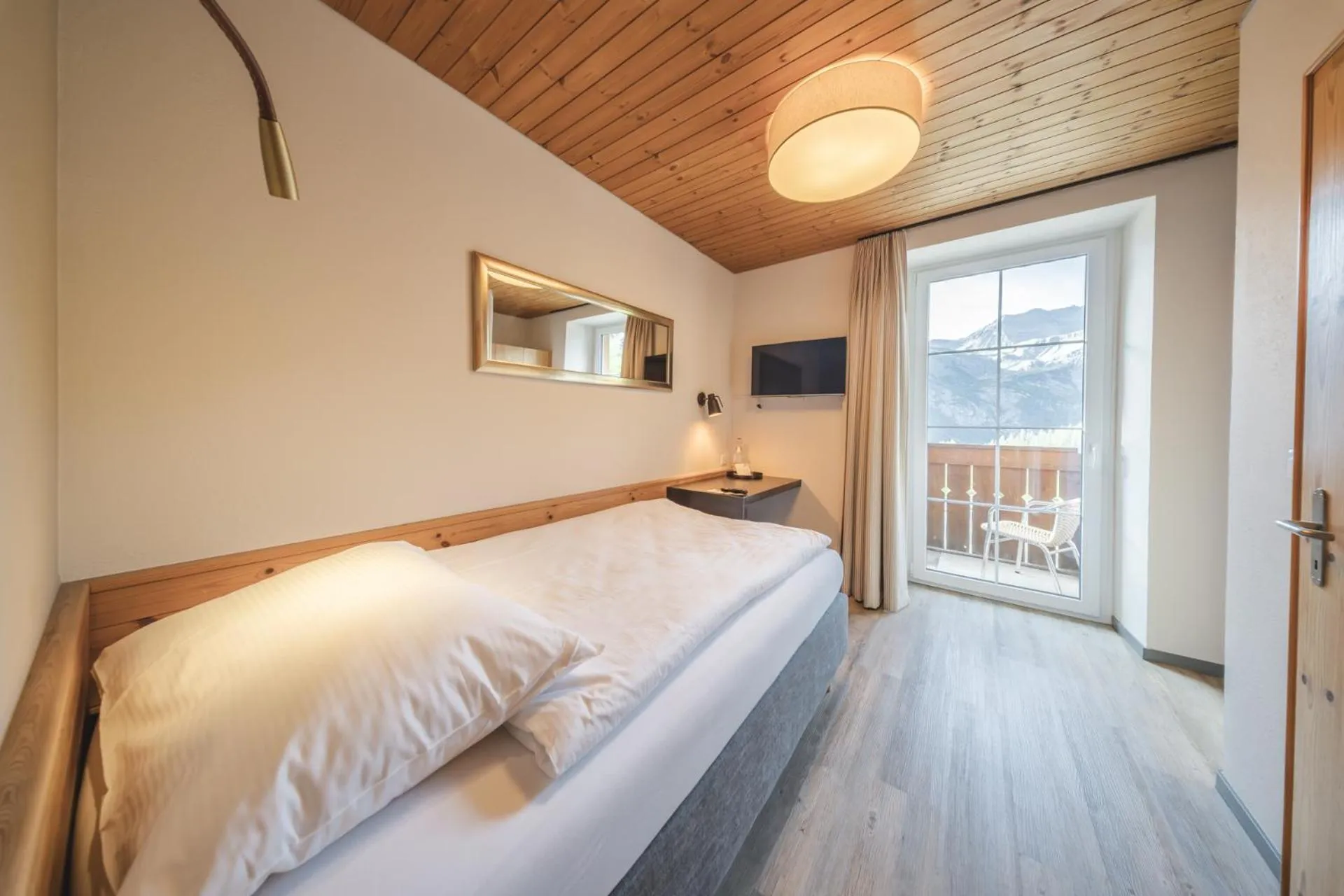Bedroom, Bed in Hotel Quellenhof - Self Check-in & Adults Only