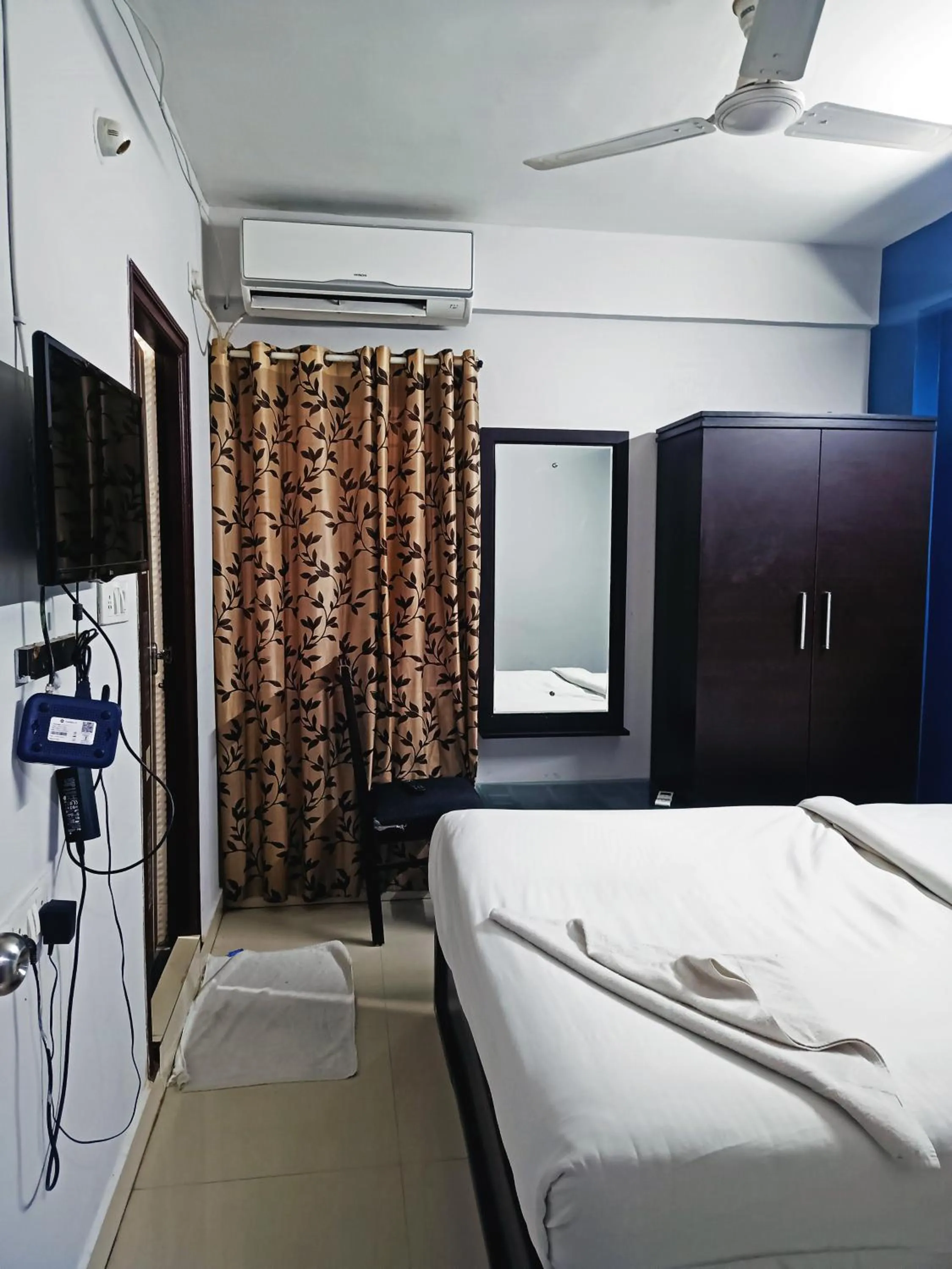 Bedroom in Delta Inn Madiwala