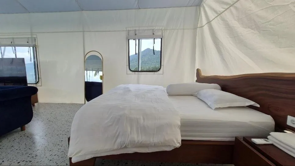 Bed in Casa de Monique Villas & Glamping Retreat
