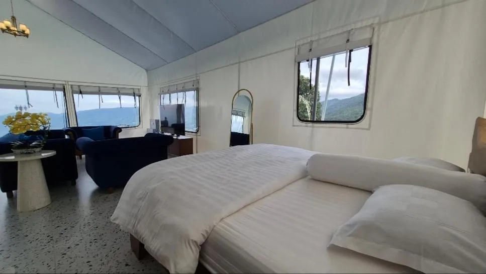 Bed in Casa de Monique Villas & Glamping Retreat