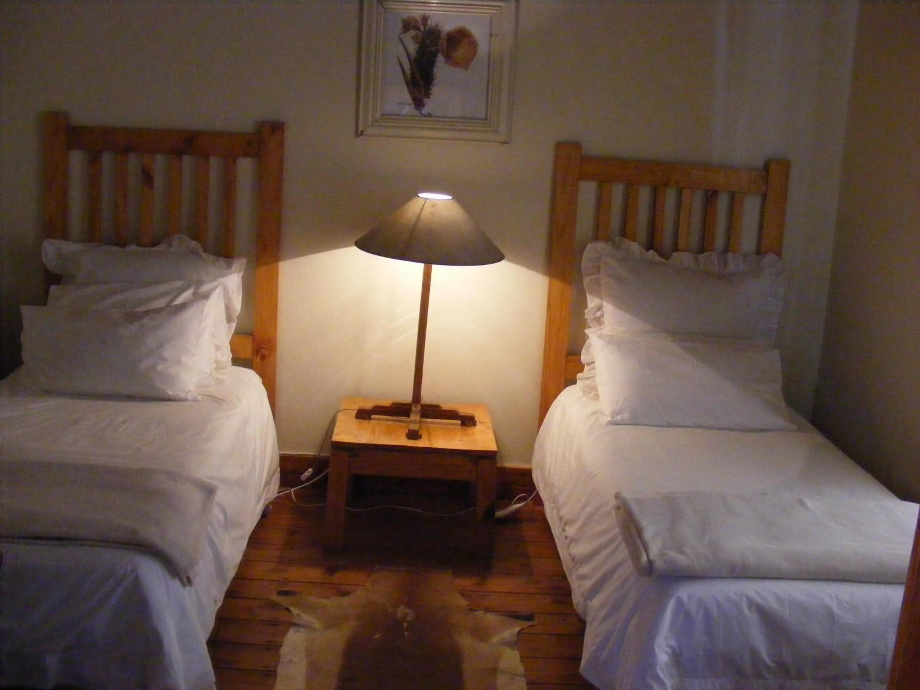 Bed in Pepper Tree Accommodation