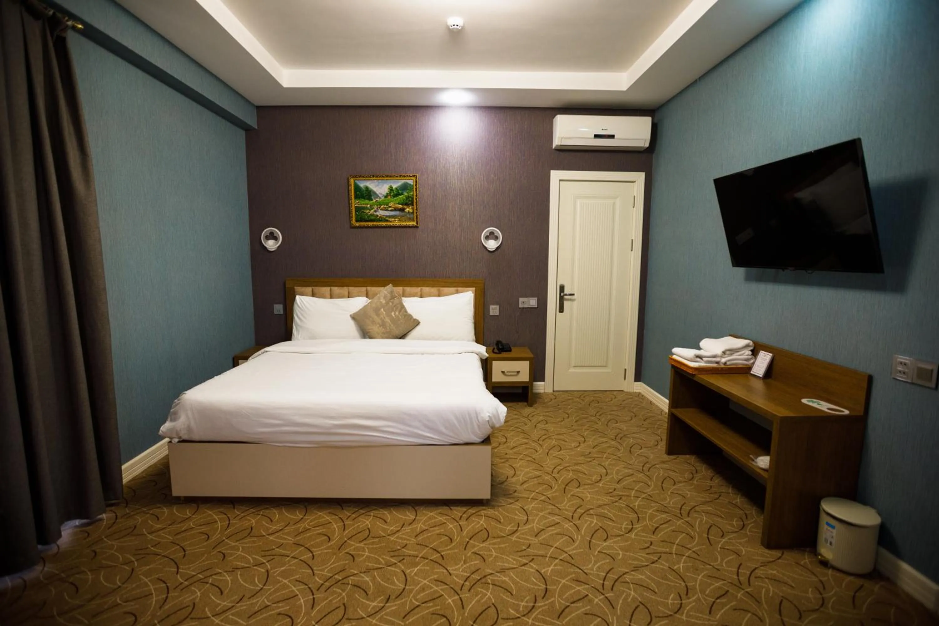 Bed in Royal Meridien Hotel