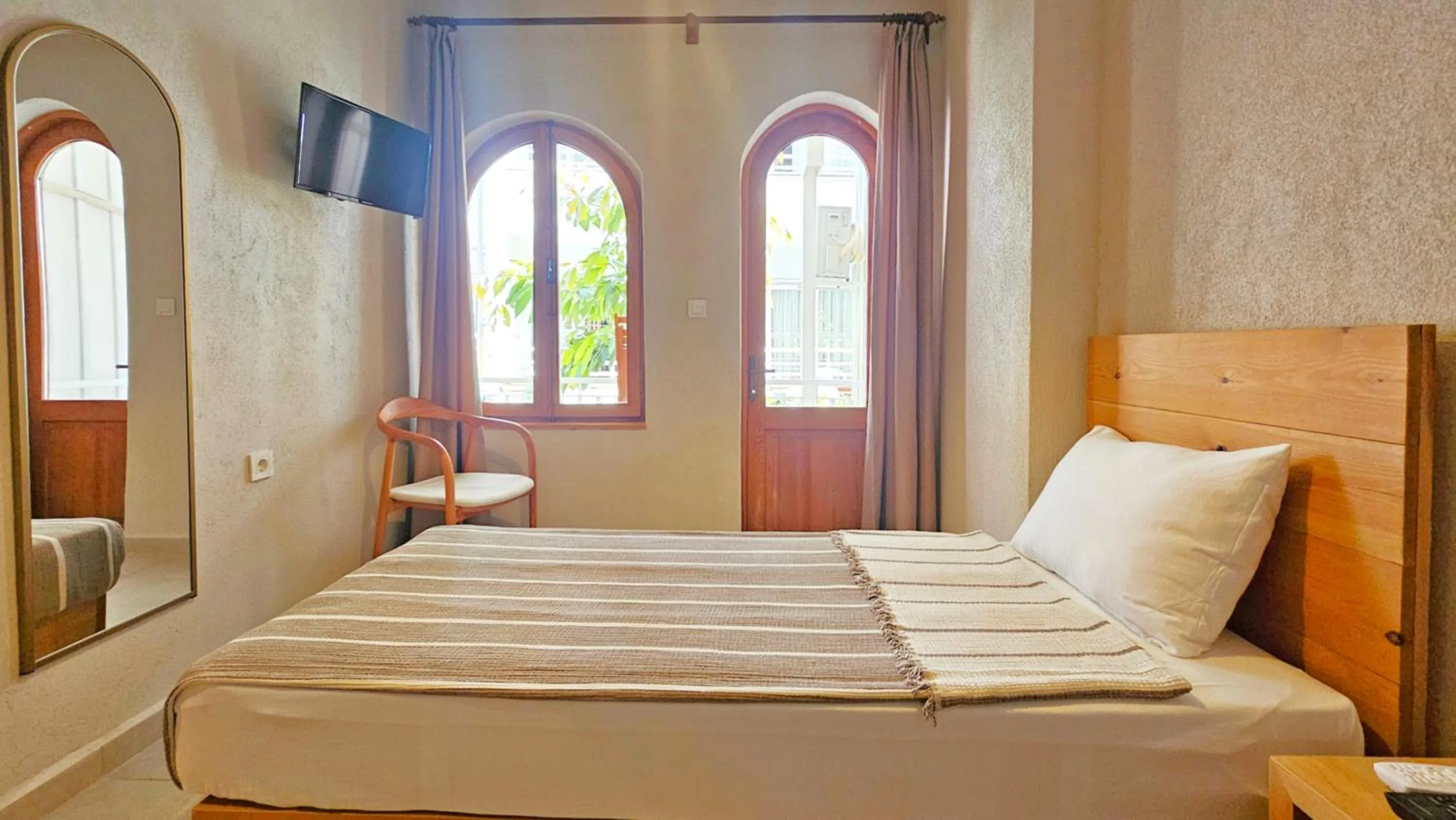 Bed in Nephos Beach Hotel