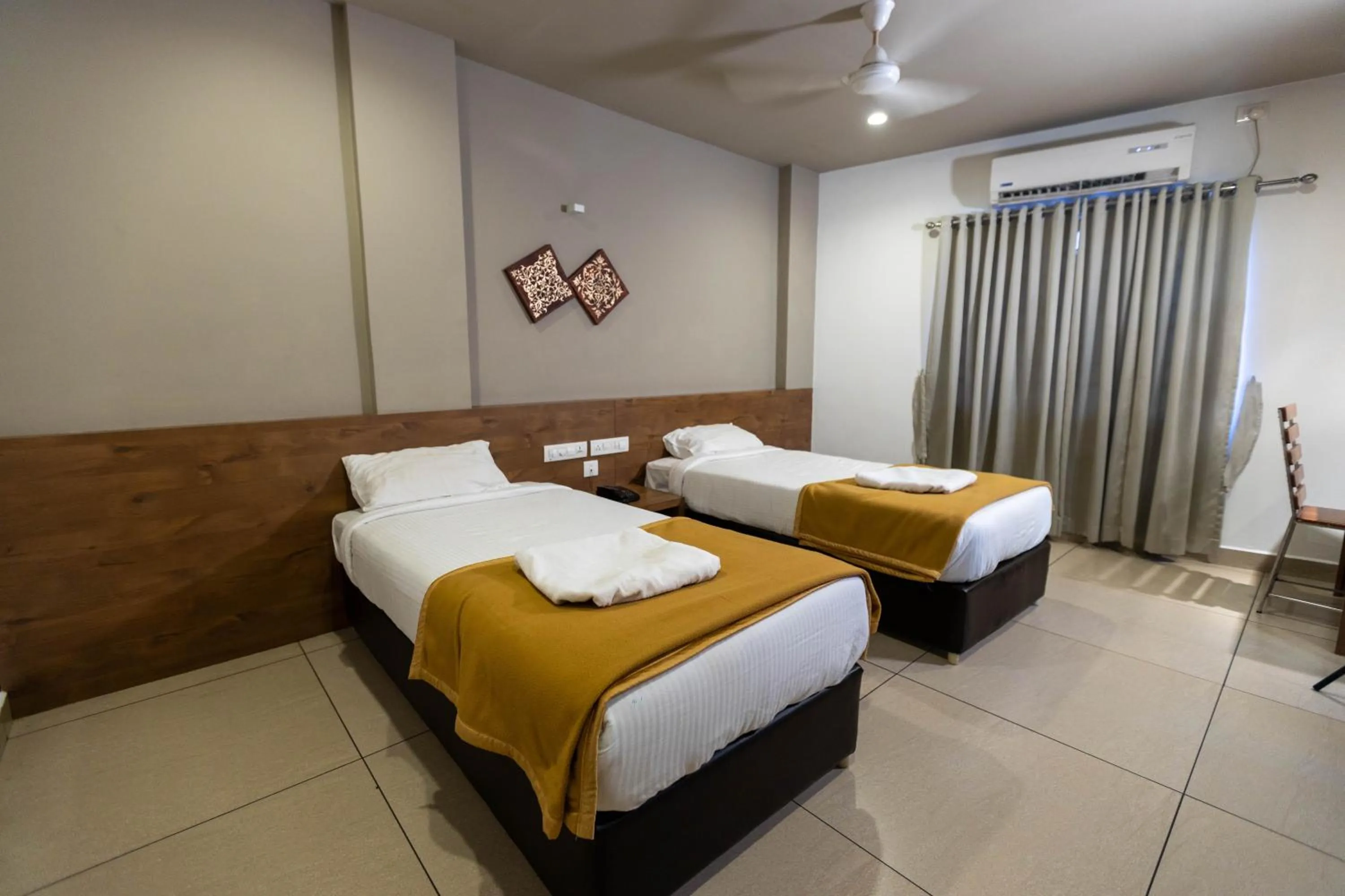 Bed in Aryaas Residency Nettoor