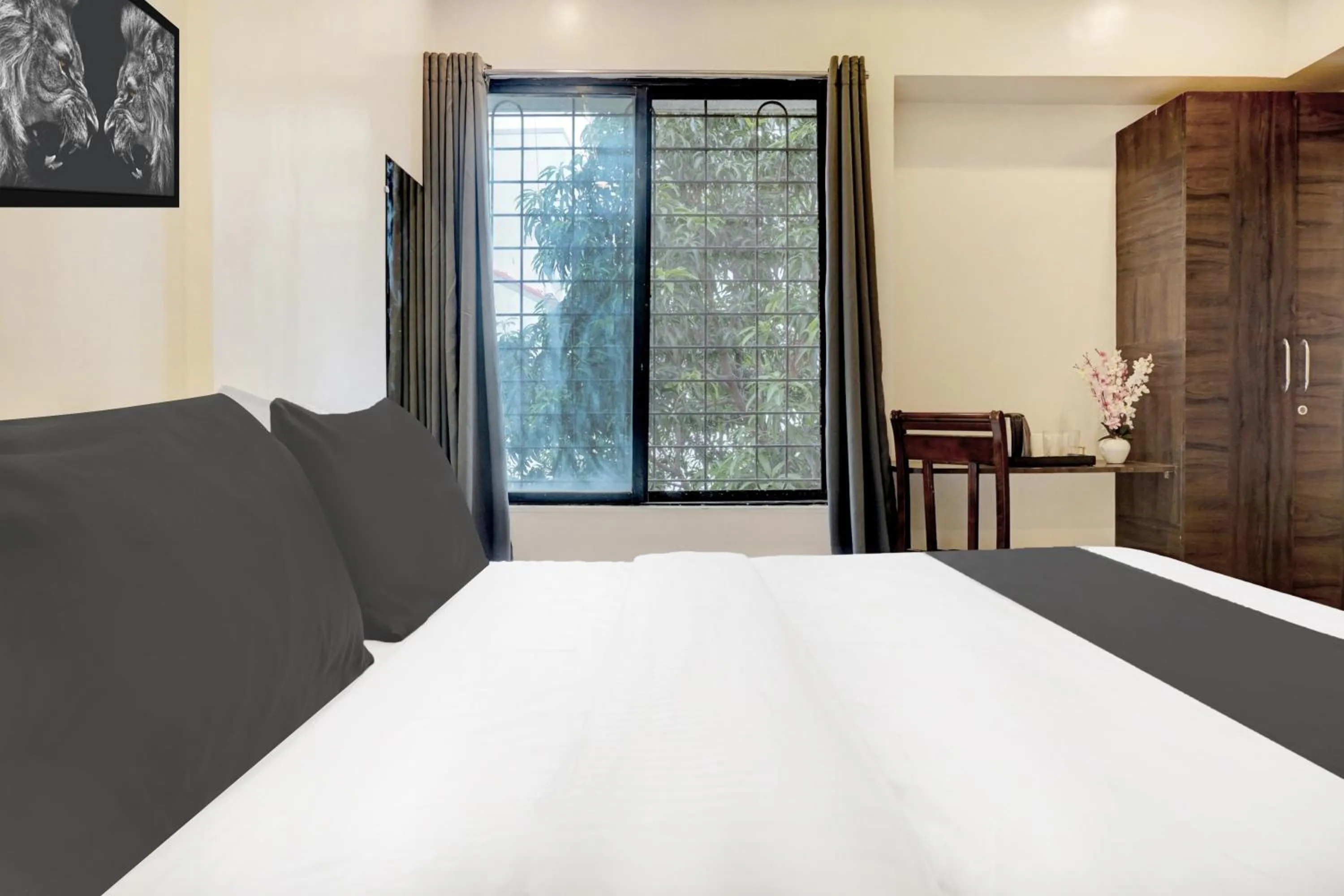Bedroom, Bed in Hotel O Laxman Nagar Baner