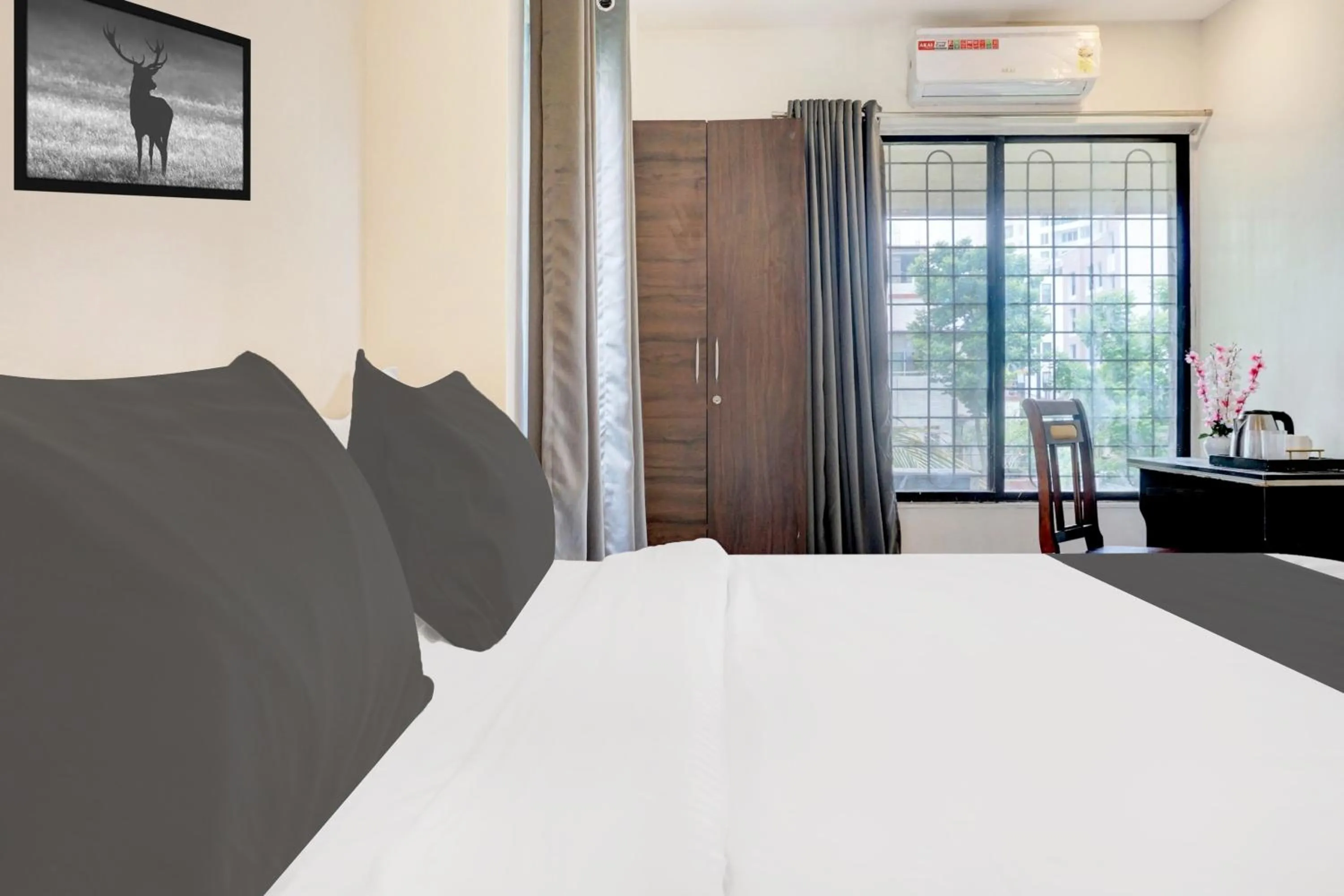 Bedroom, Bed in Hotel O Laxman Nagar Baner