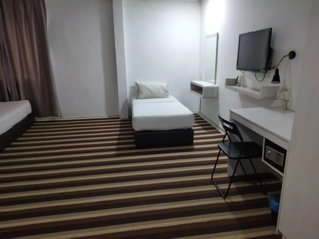 Bed in First Residence Hotel Kemaman