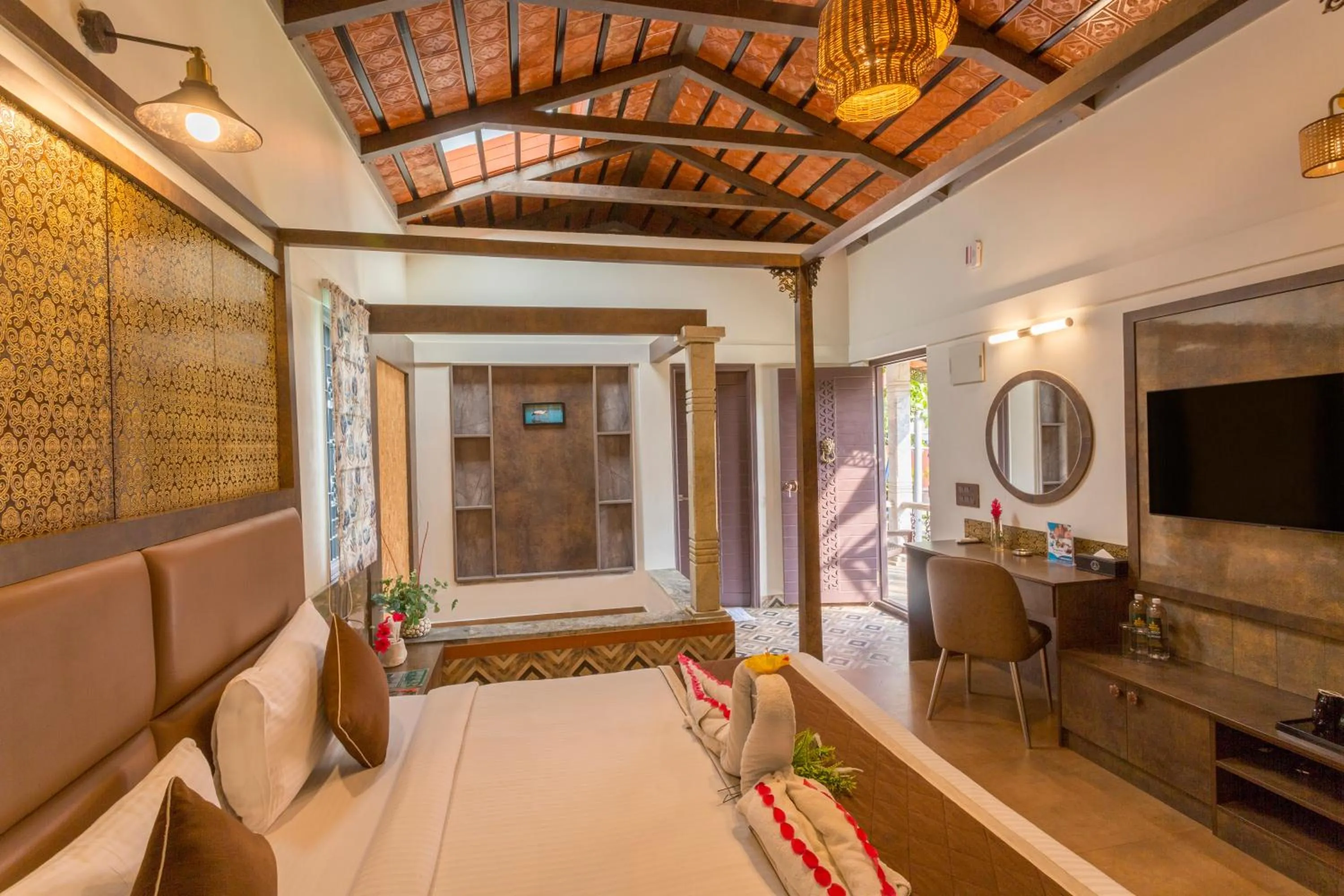 Bed in Nirantara Resort & Spa