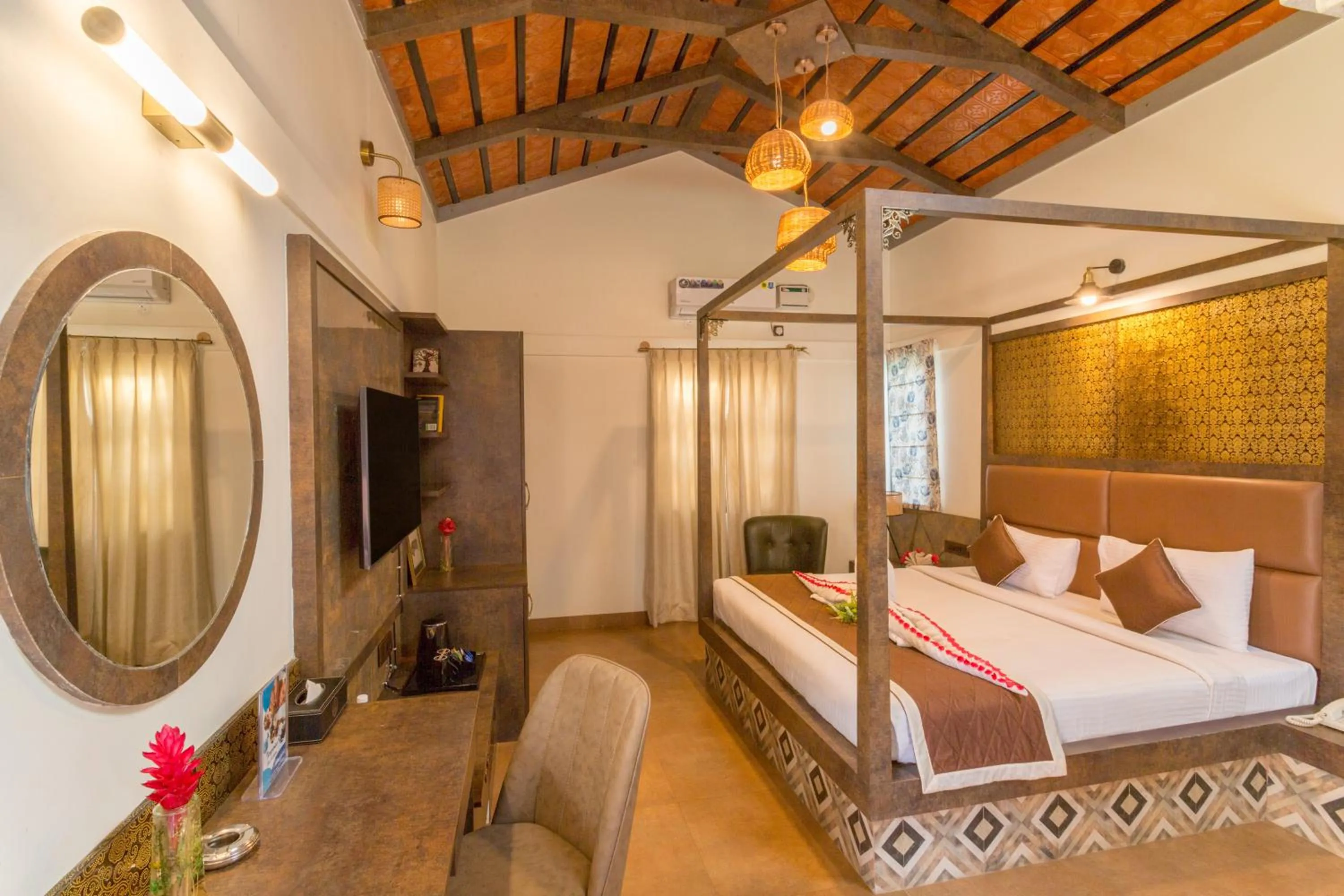 Bed in Nirantara Resort & Spa