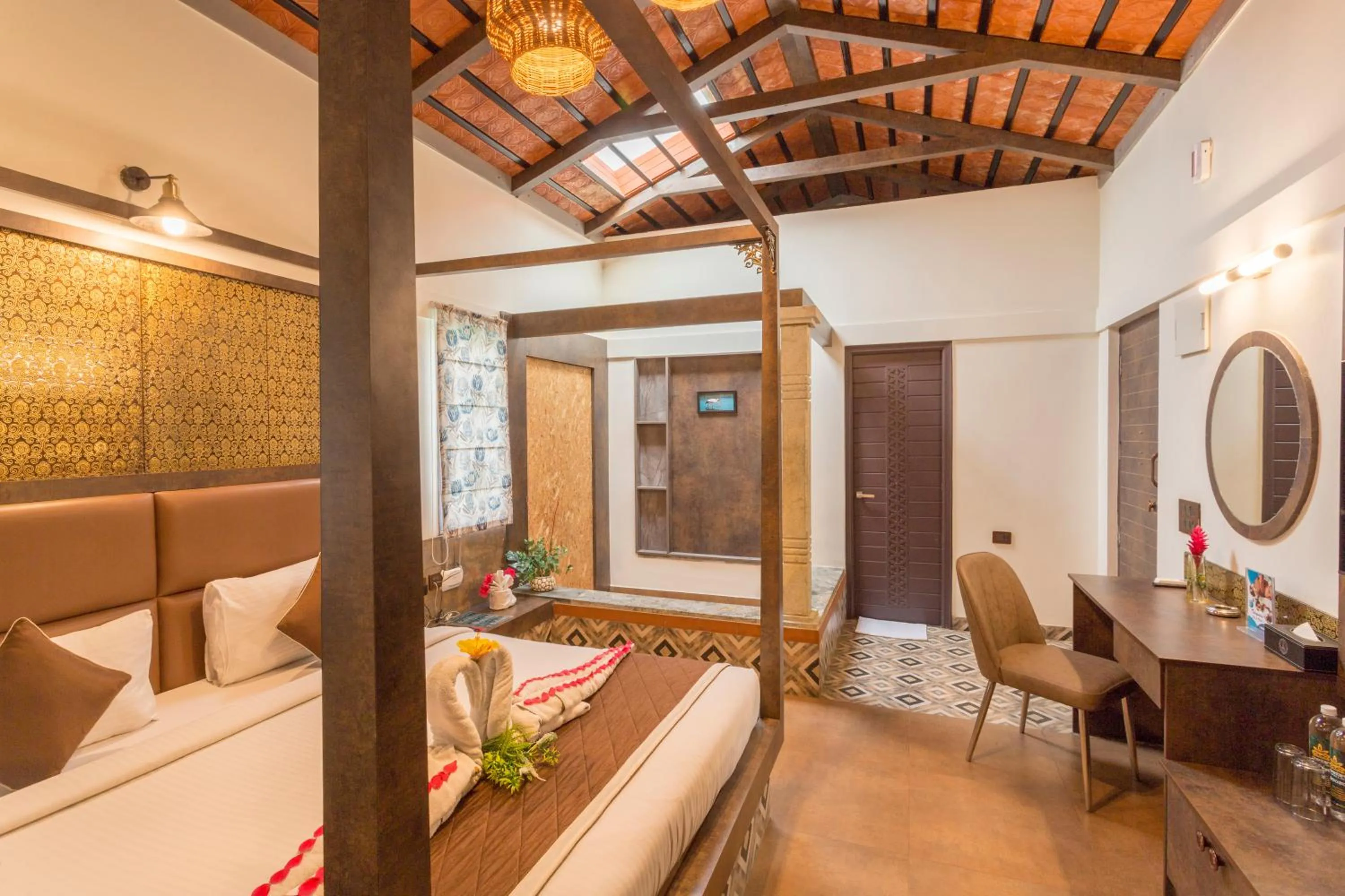 Bed in Nirantara Resort & Spa