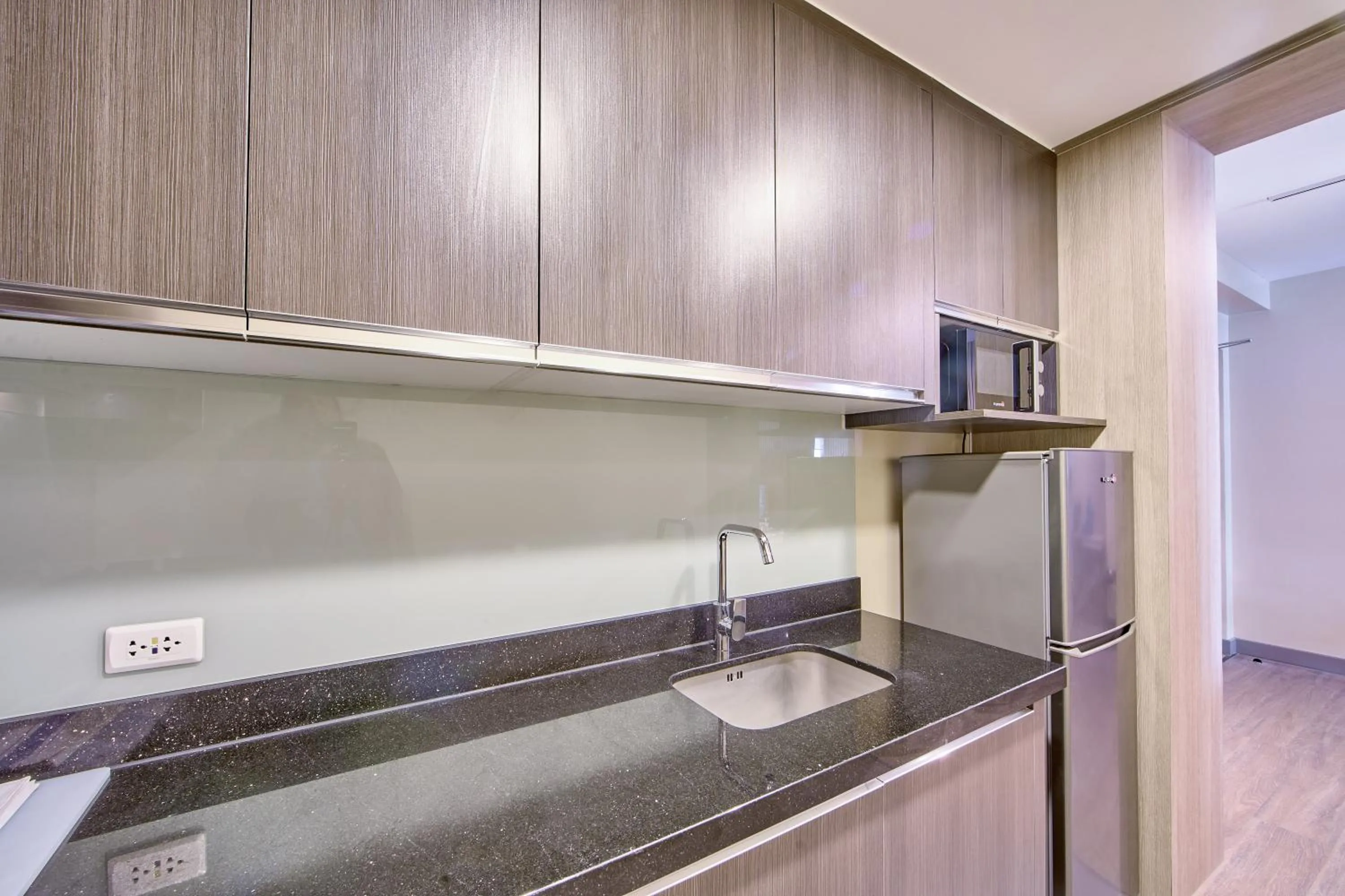 Kitchen or kitchenette in The Connor Serviced Residences Managed by HII