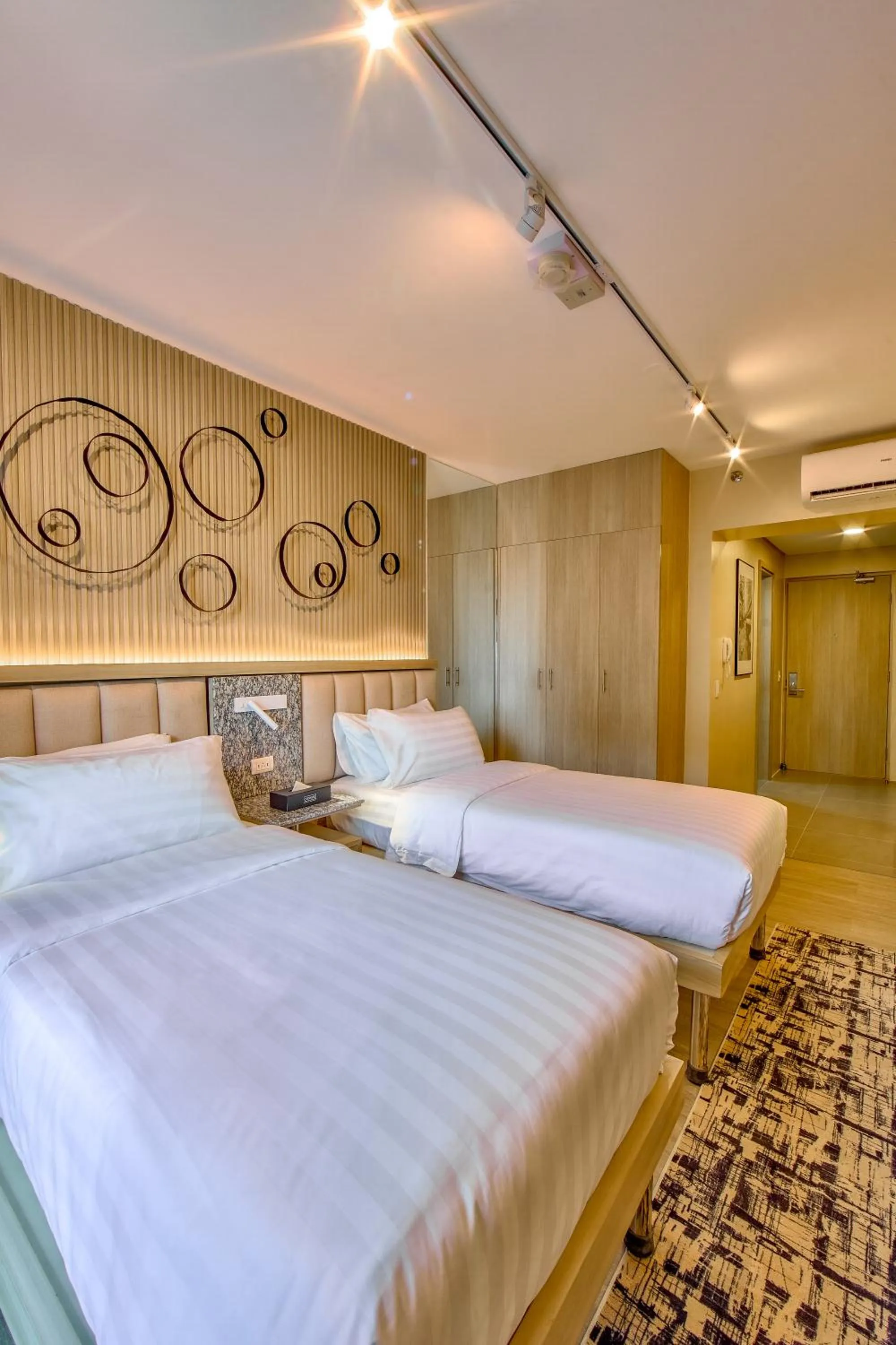 Photo of the whole room, Bed in The Connor Serviced Residences Managed by HII