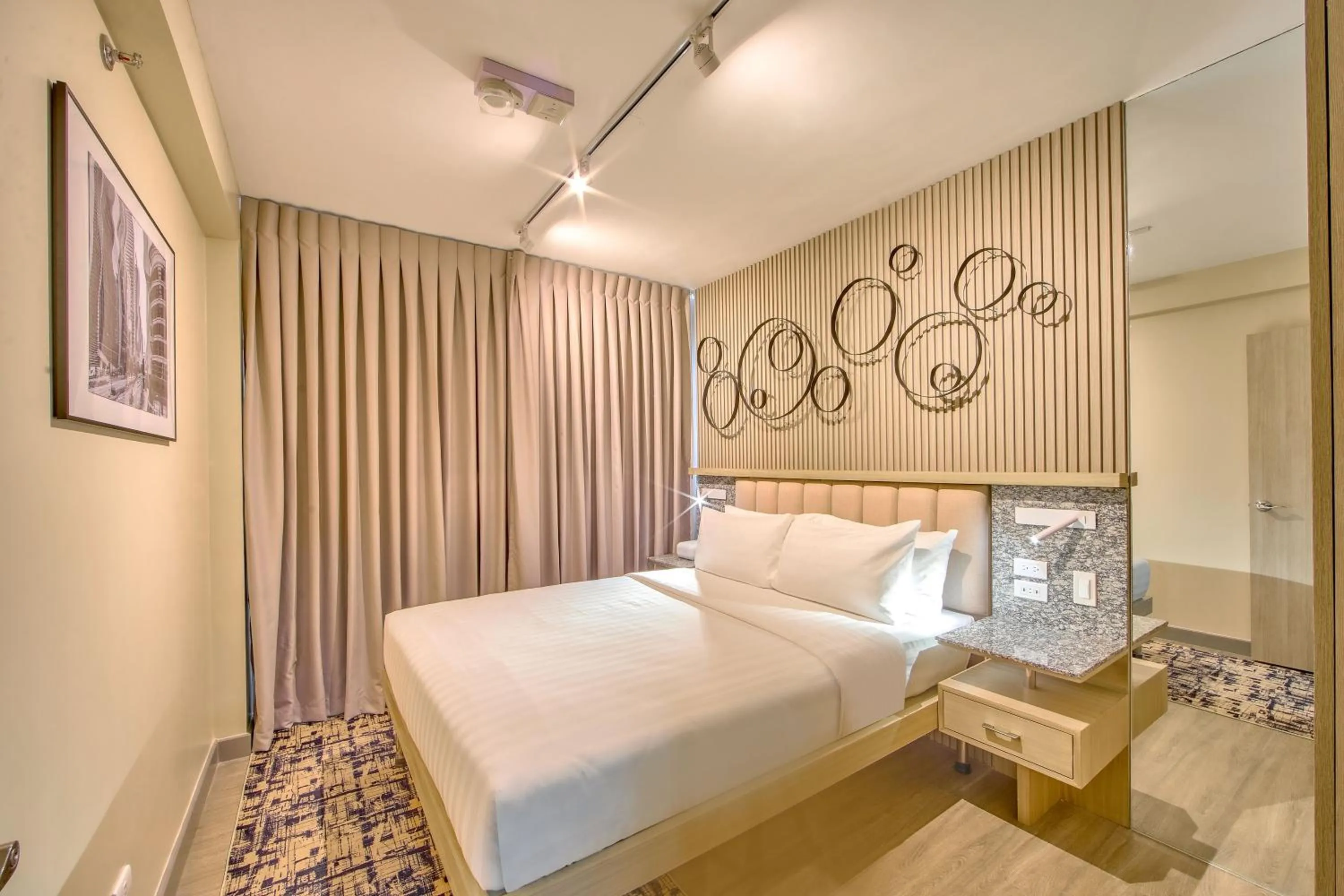 Bed in The Connor Serviced Residences Managed by HII