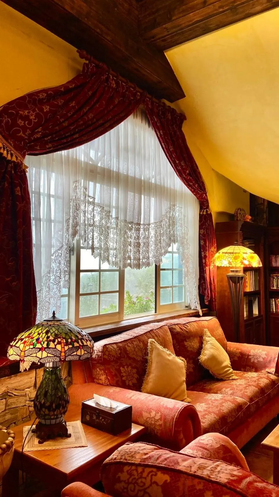 Communal lounge/ TV room in 日初雲來民宿