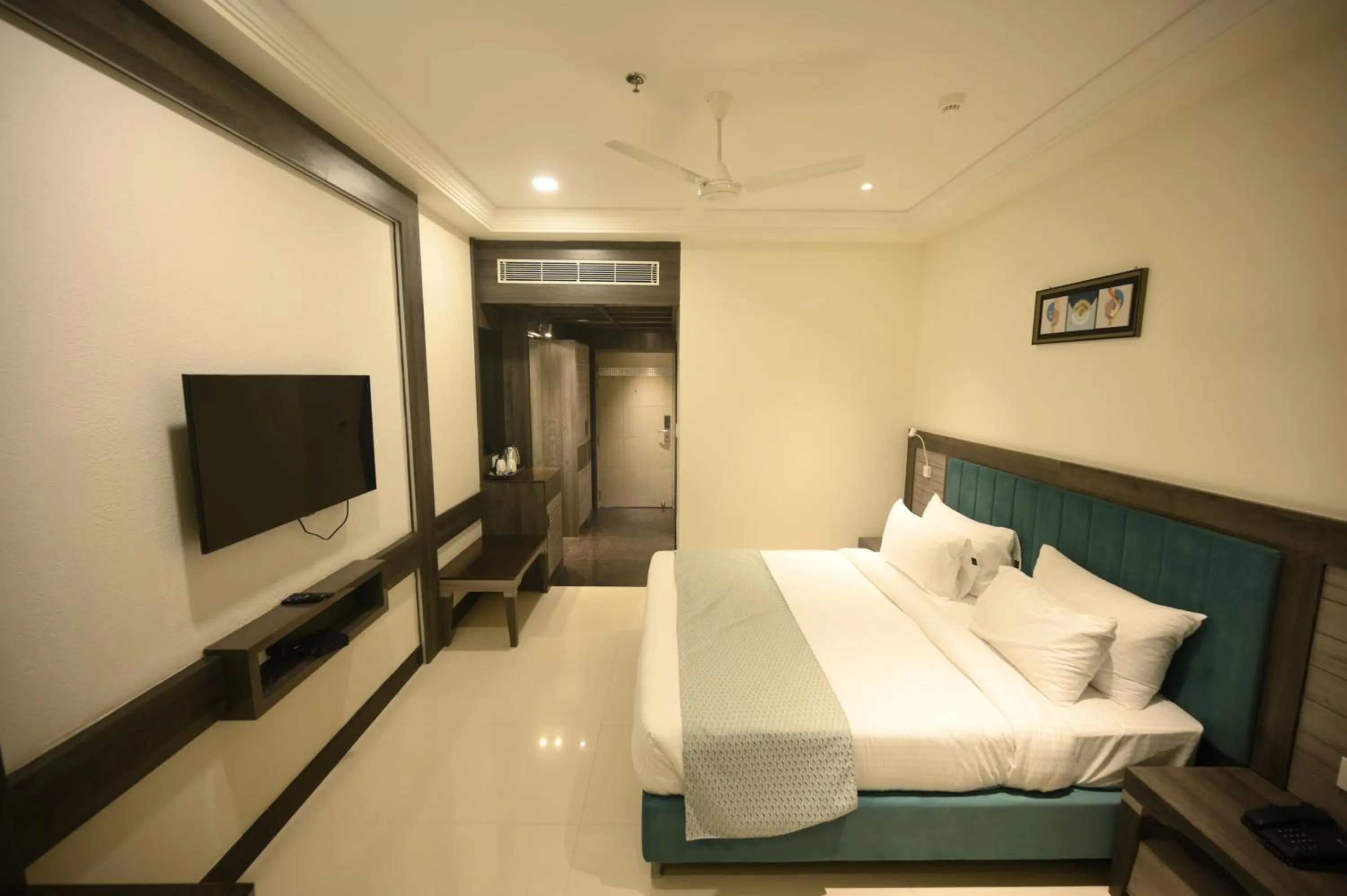 Bed in The Mudra Hotel