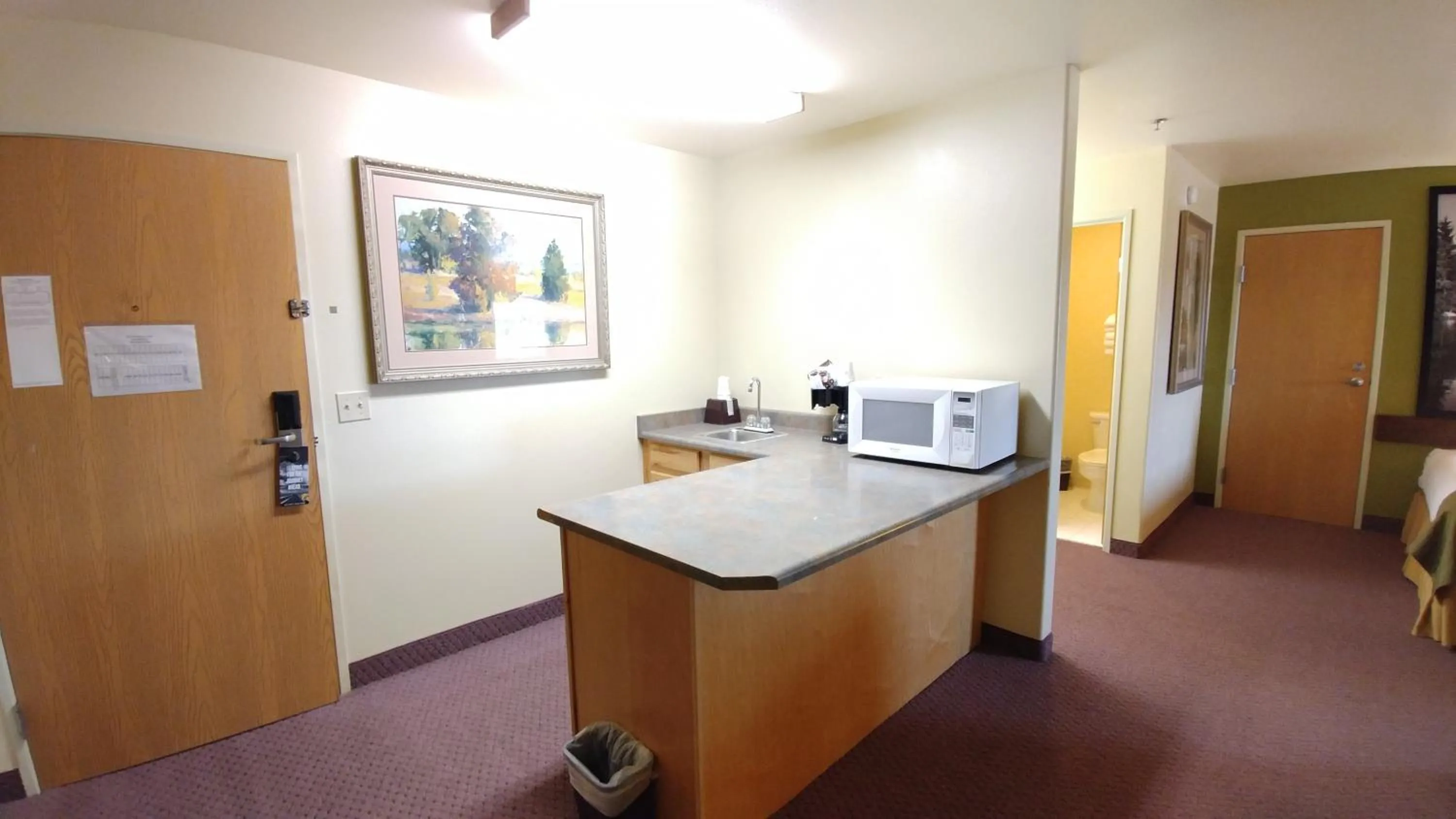 Kitchen or kitchenette in Super 8 by Wyndham McCall