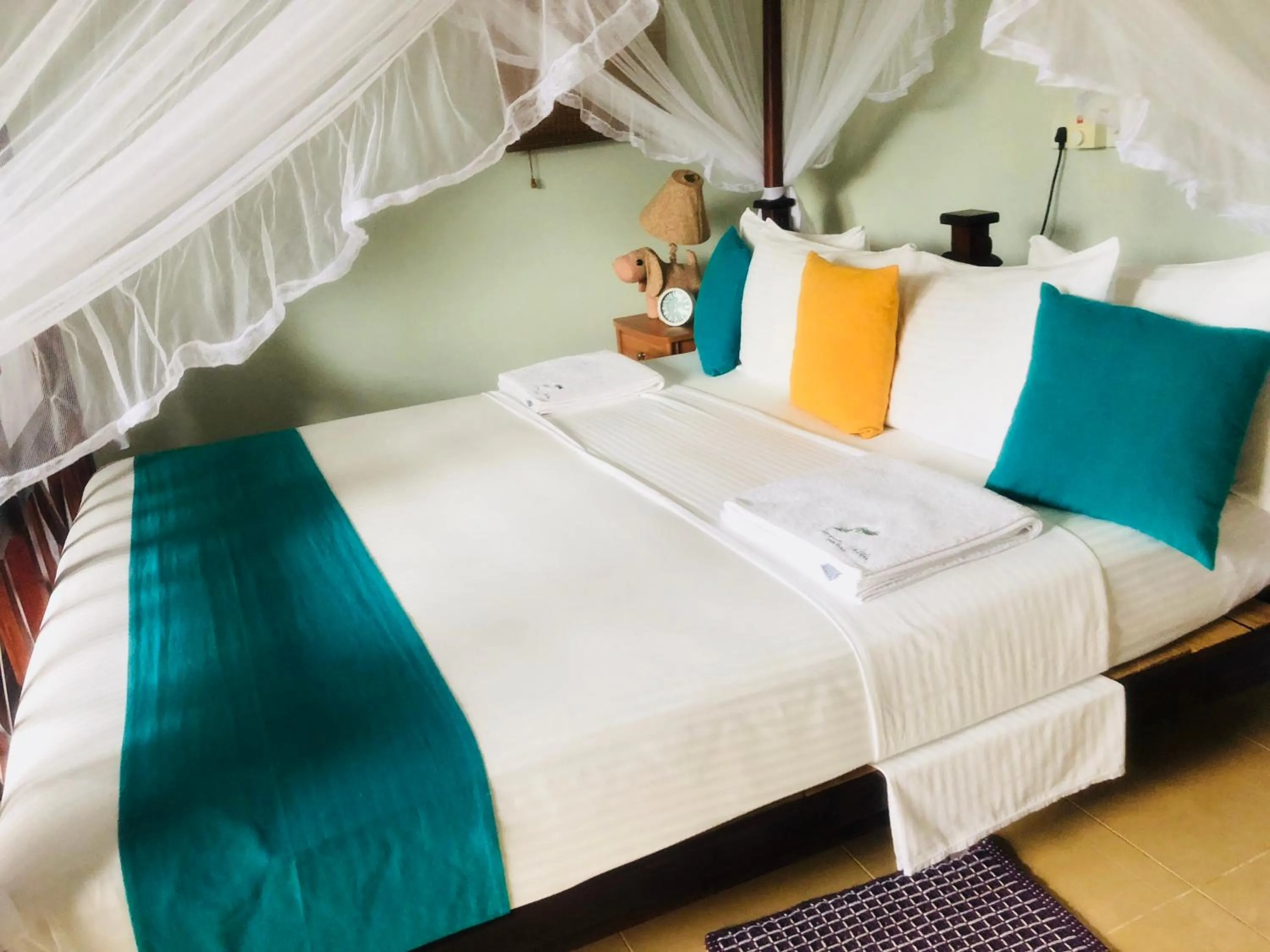 Bed in Peacock Villa