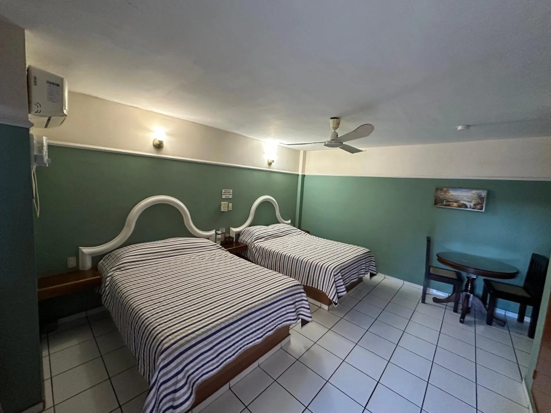 Bedroom in Blue Pacific Suites