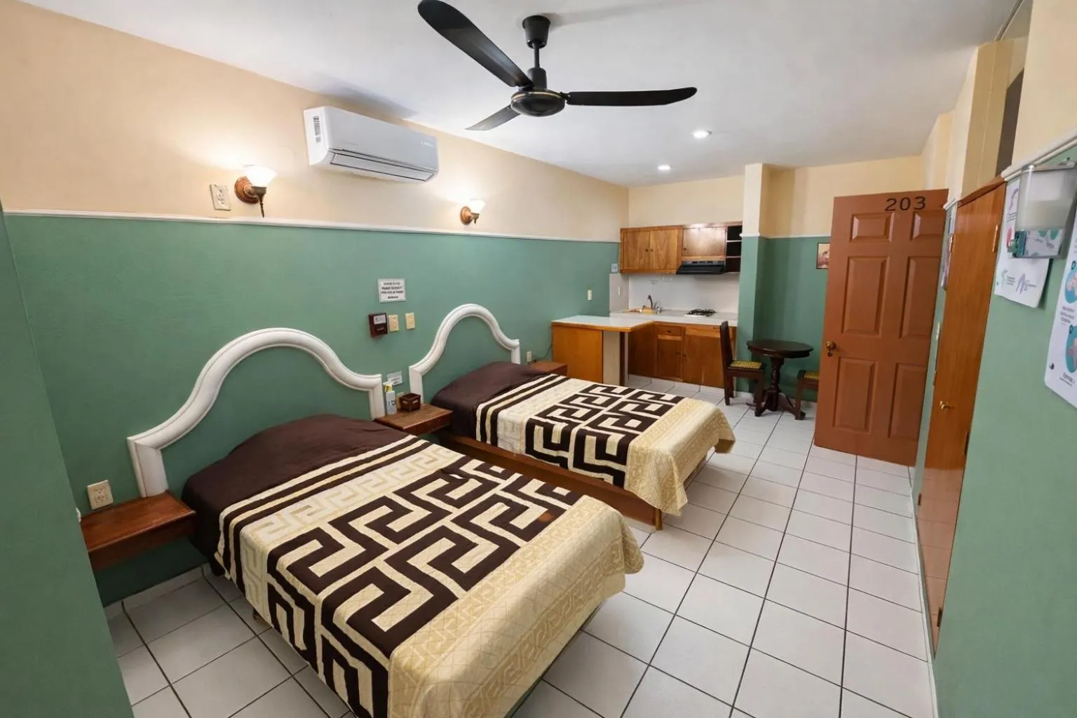 Photo of the whole room, Bed in Blue Pacific Suites