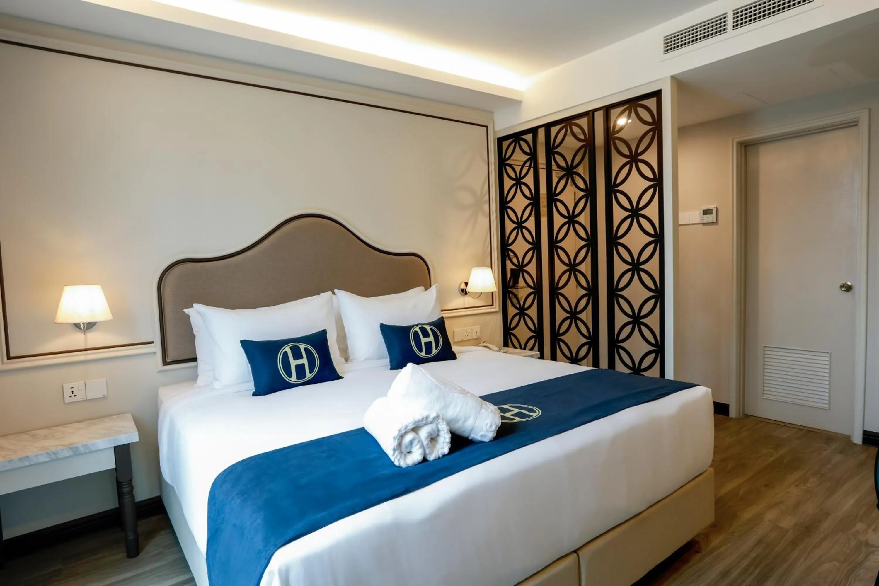 Bed in The Host Hotel