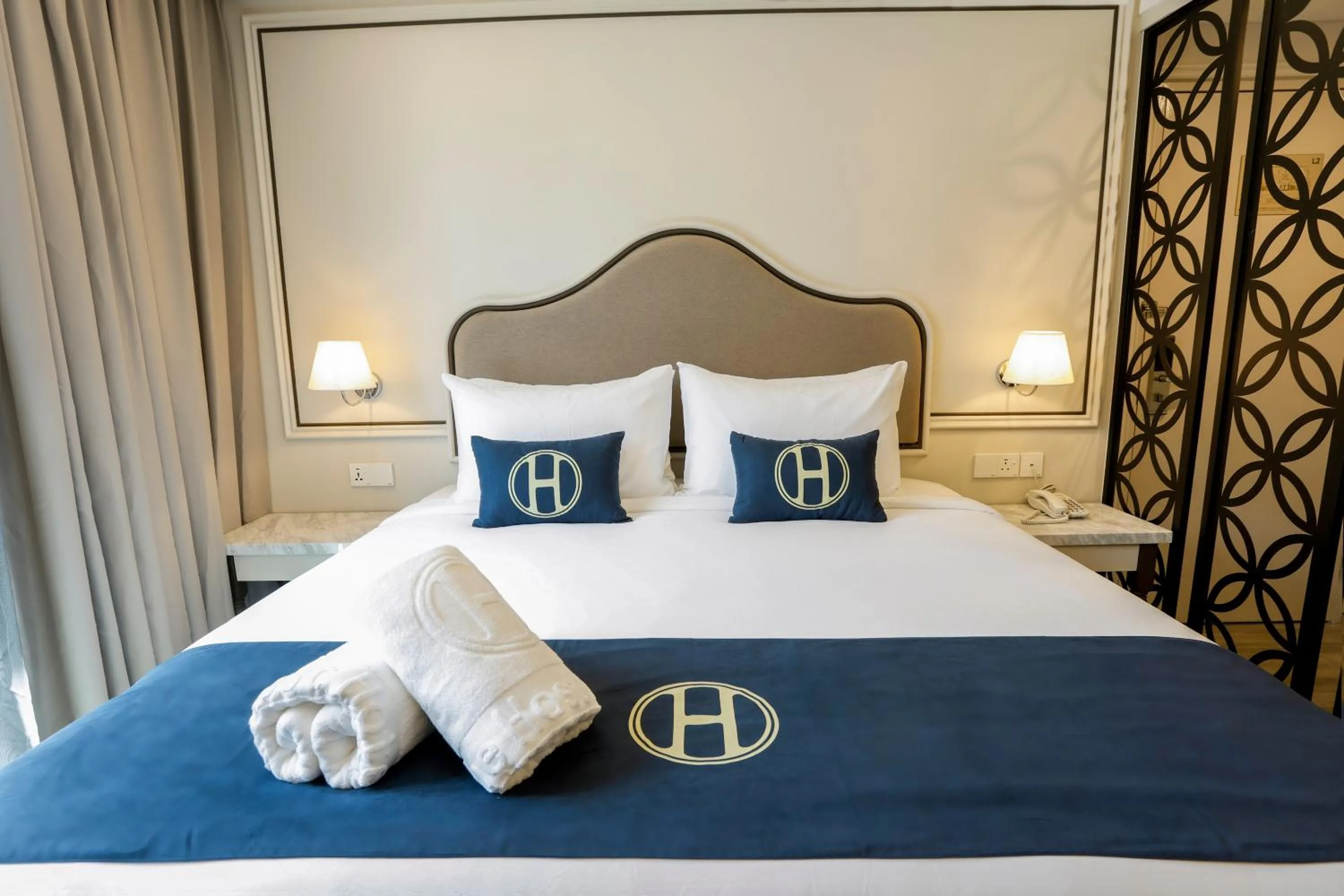 Bed in The Host Hotel