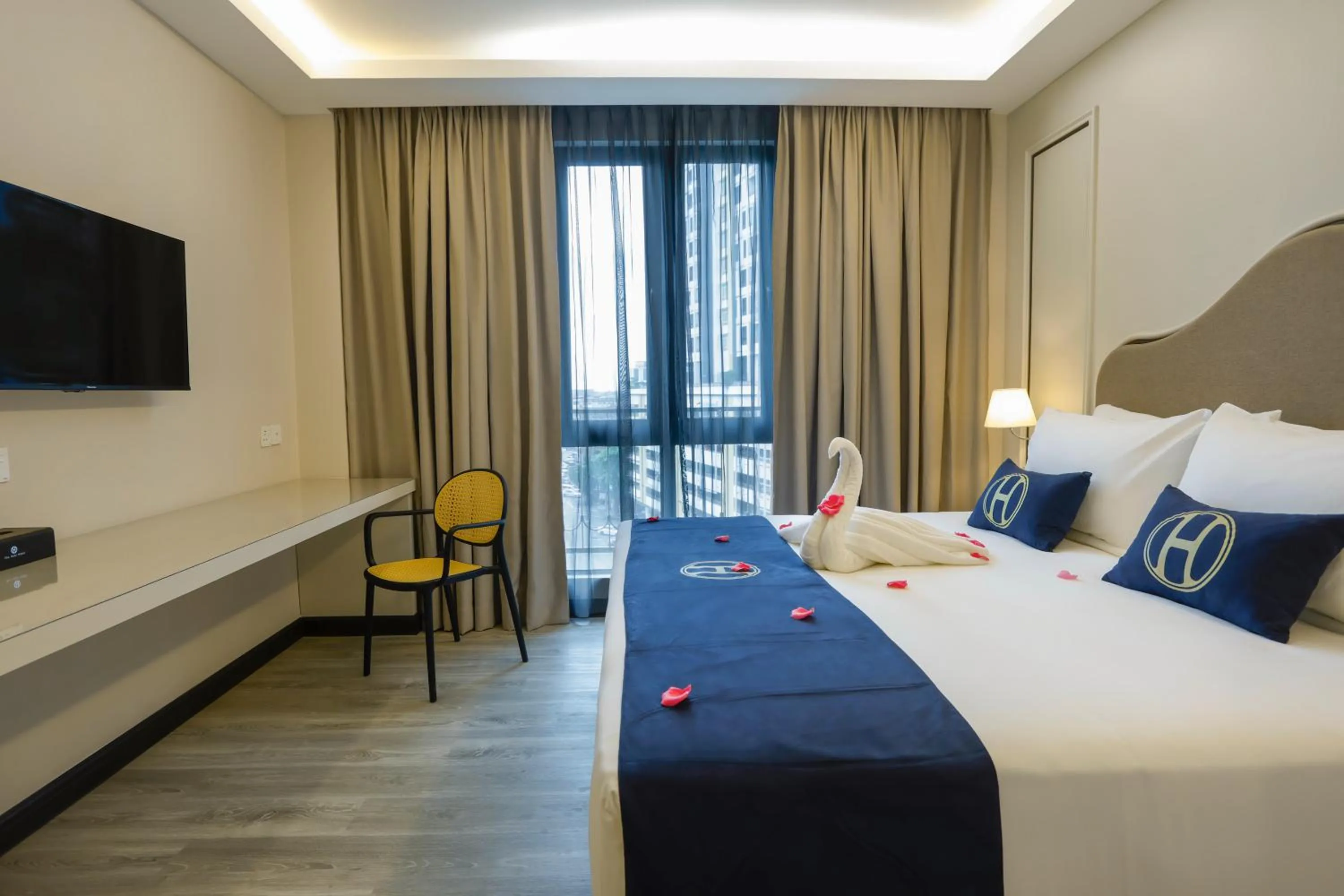 Bed in The Host Hotel