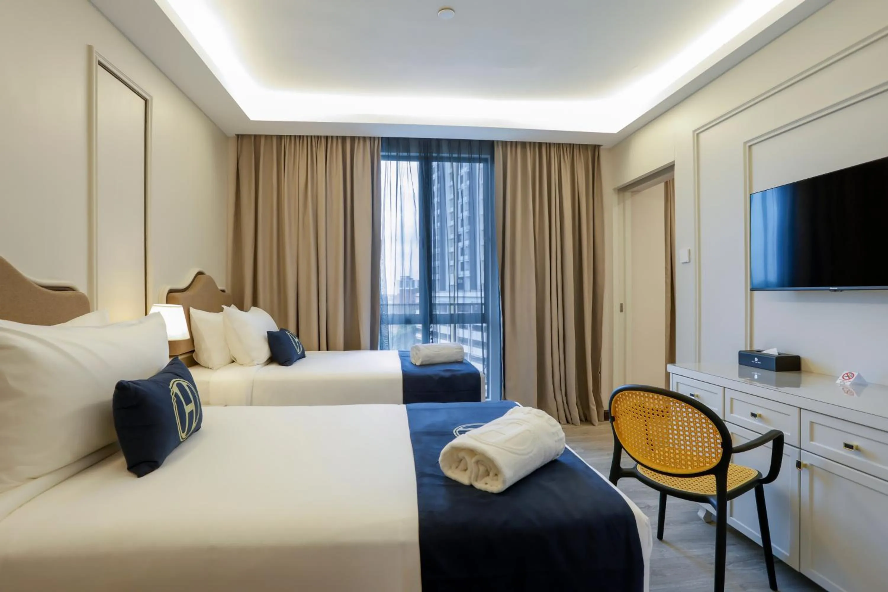 Bed in The Host Hotel