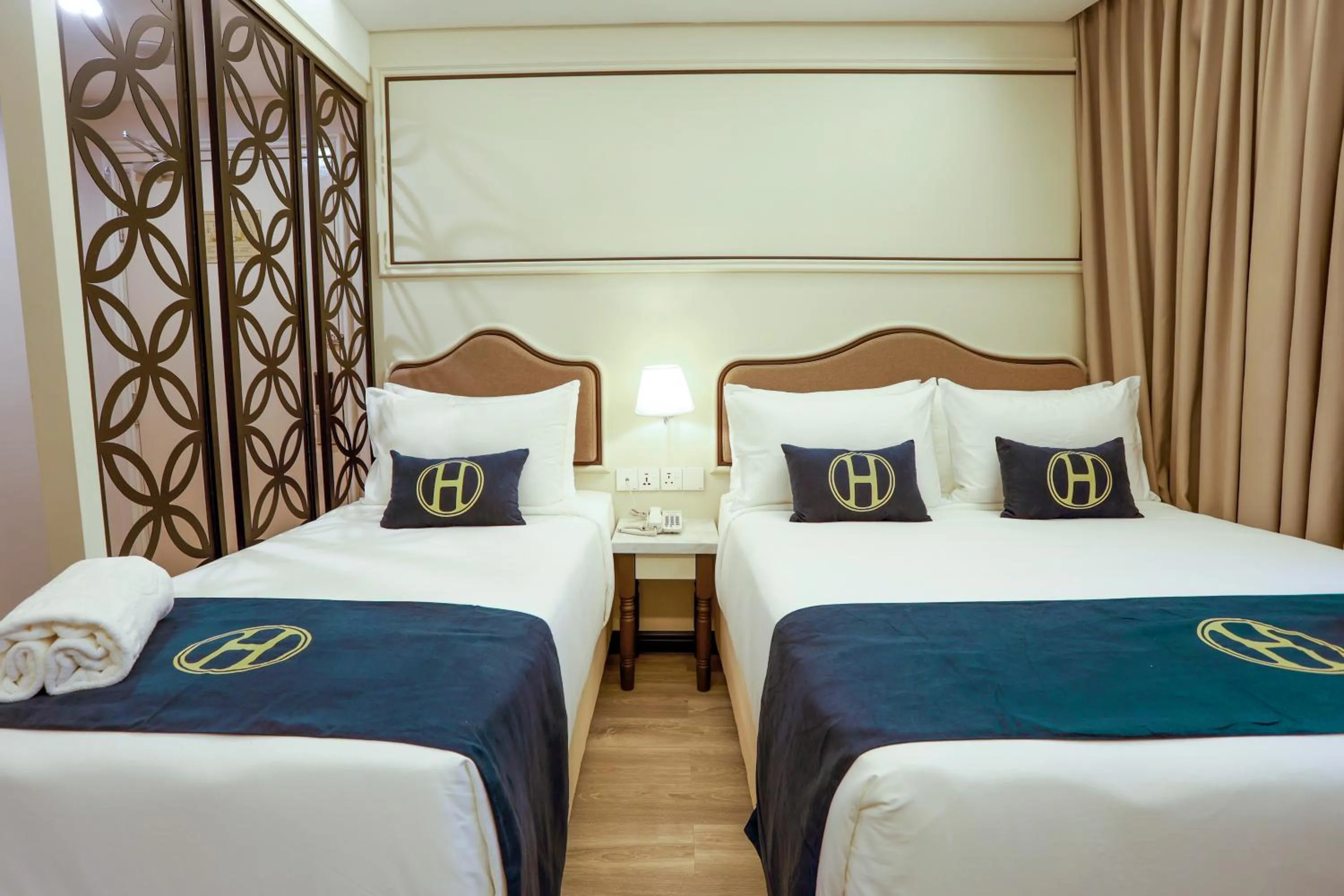 Bed in The Host Hotel