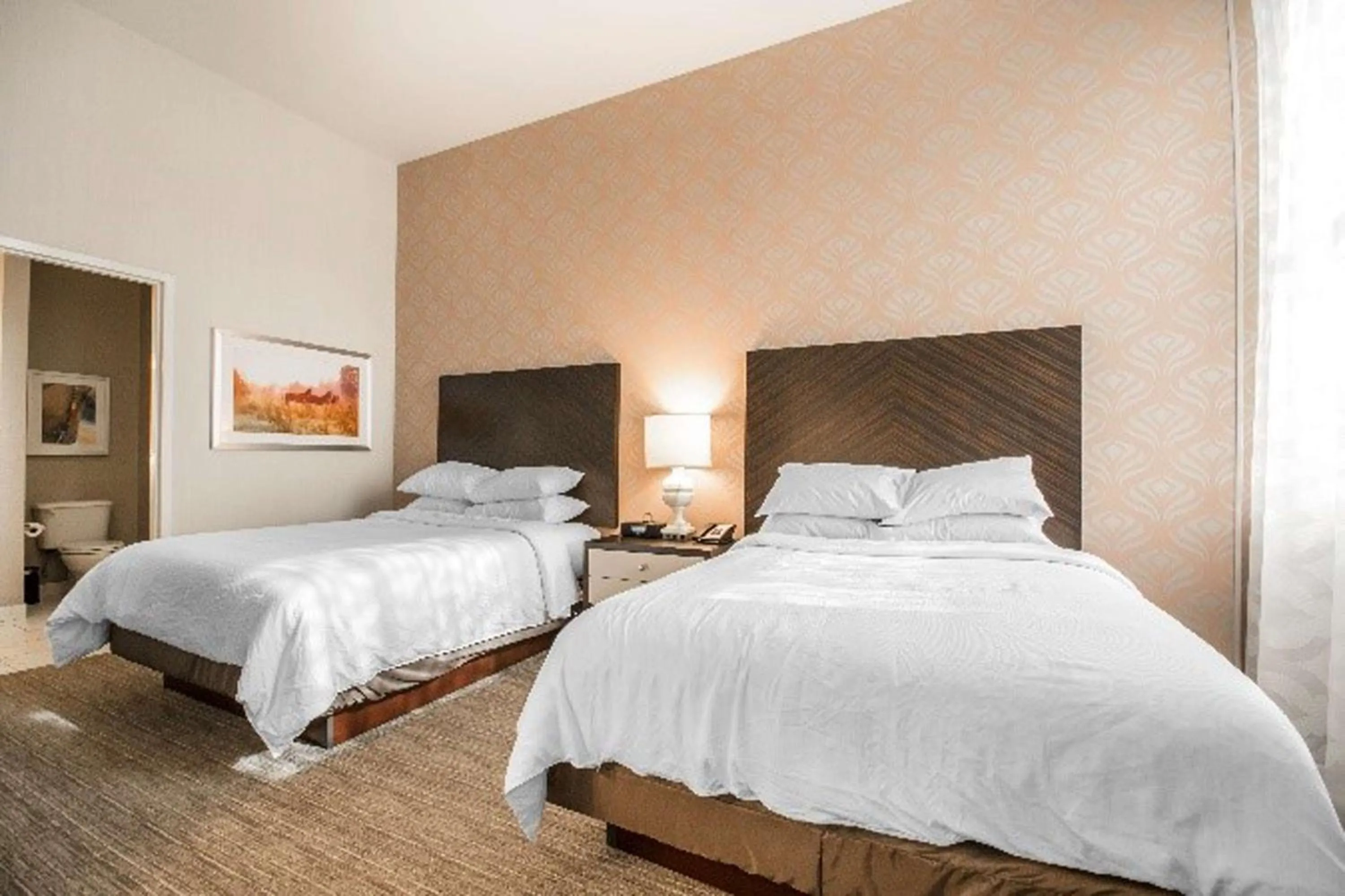 Bed in Embassy Suites Louisville Downtown