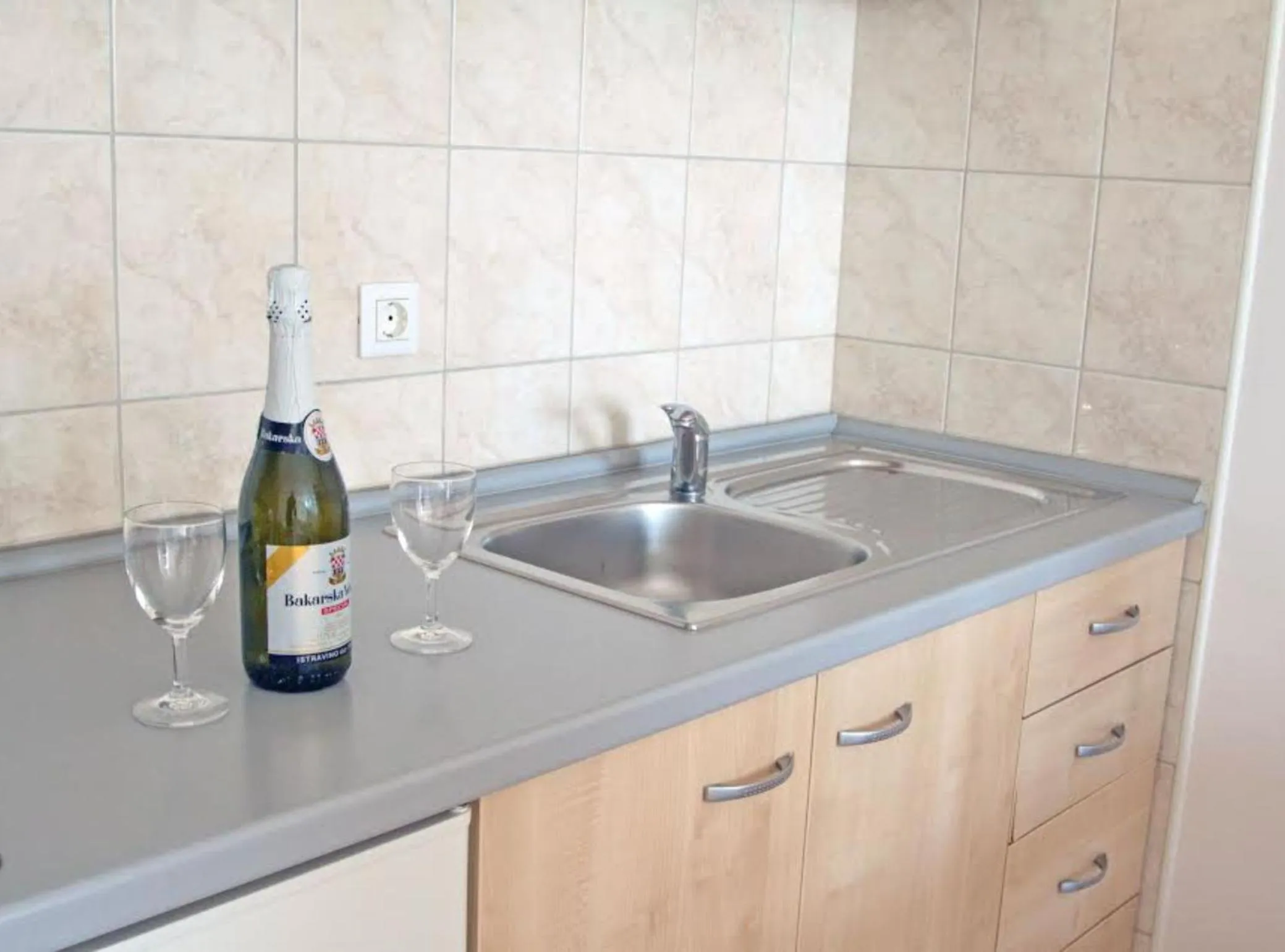 Kitchen or kitchenette in Beachfront Apartments Tamarix