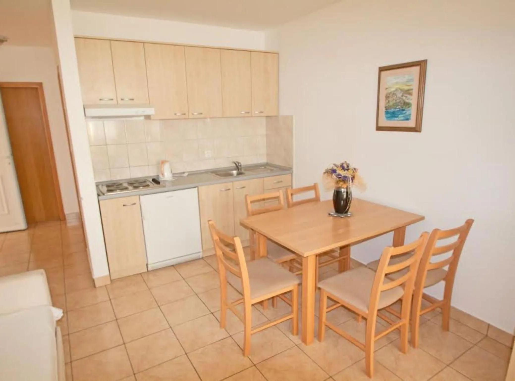 Dining area in Beachfront Apartments Tamarix