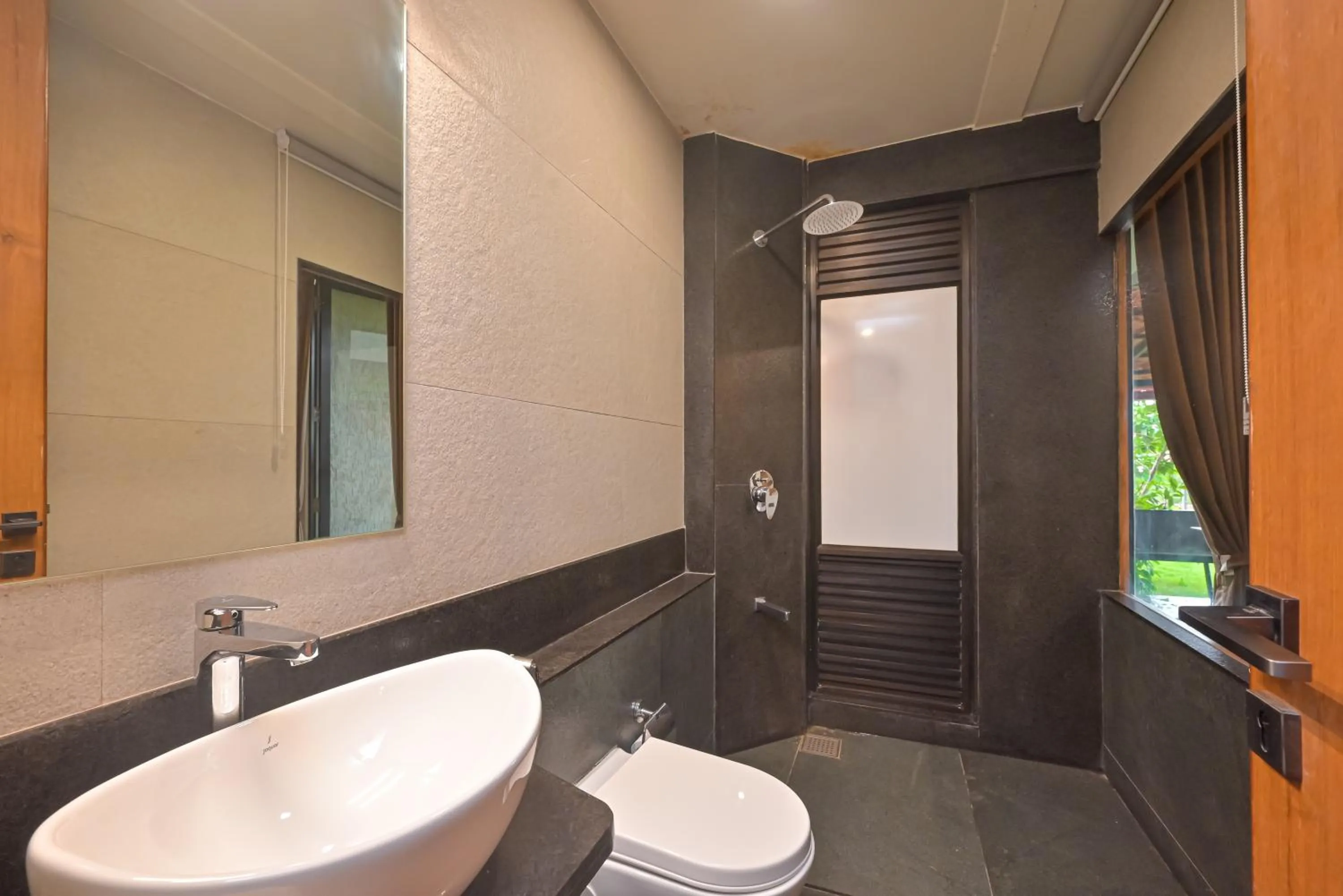 Shower in Bliss Nirvana Resort, Lonavala