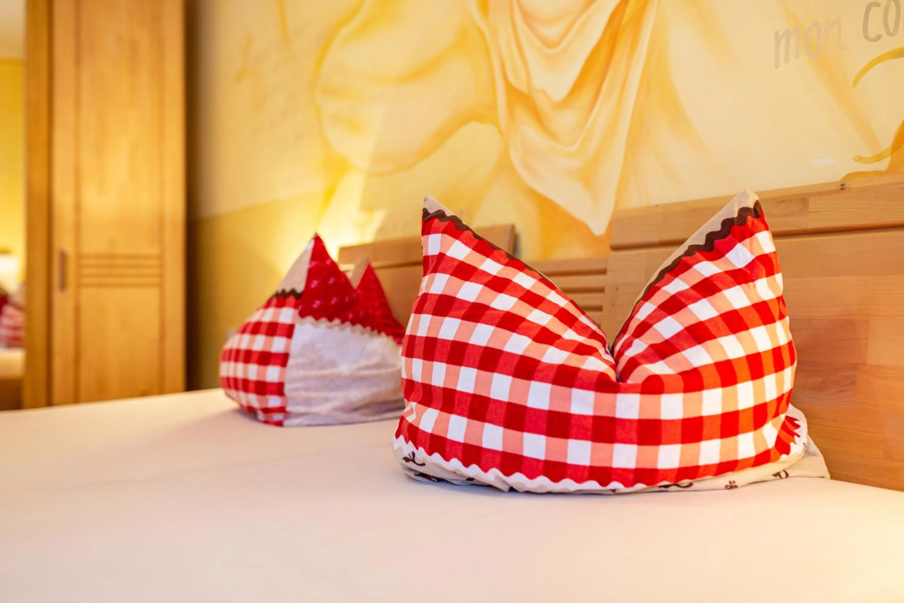 Bed in SCHUSTERjunge Aparthotel