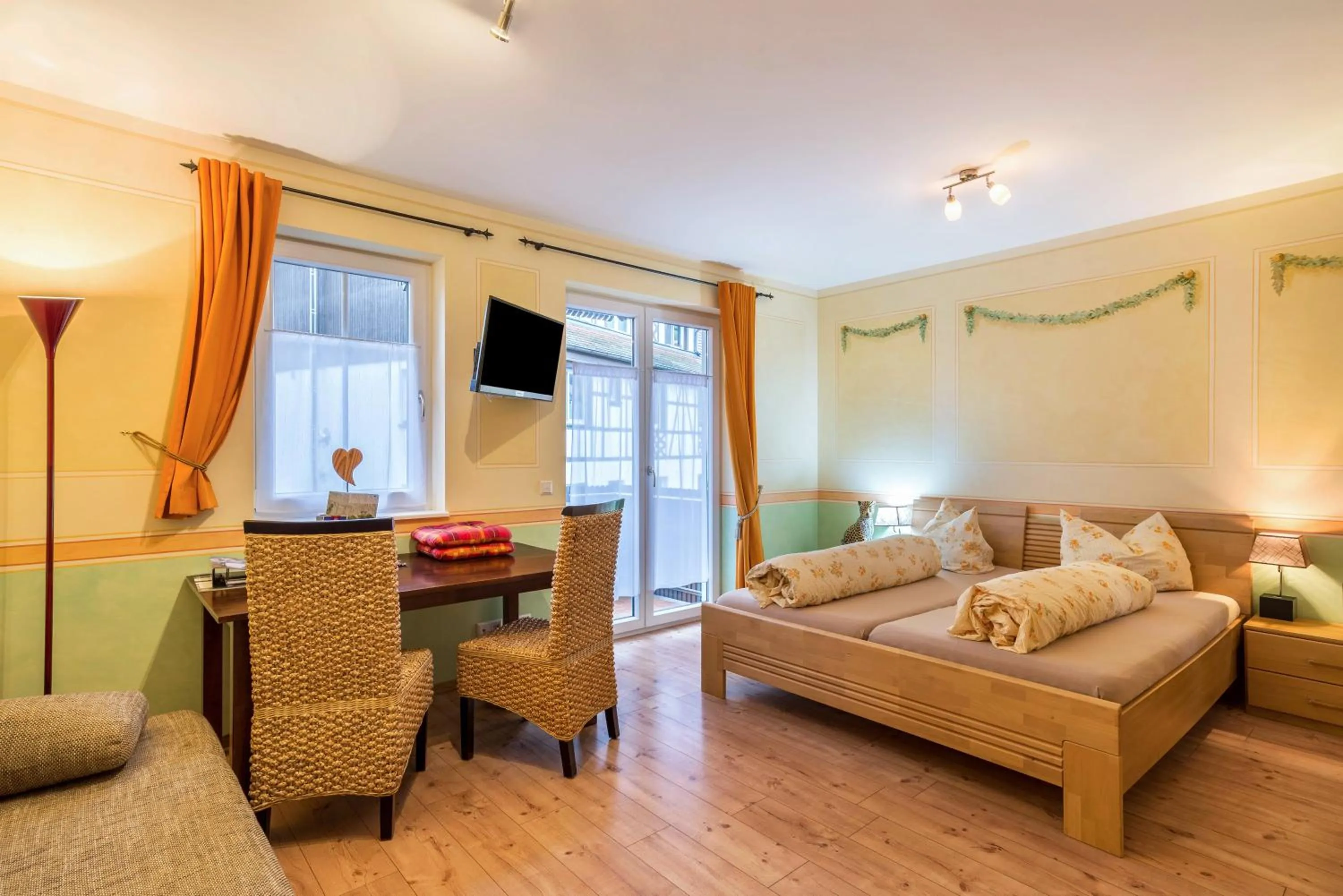 Bed in SCHUSTERjunge Aparthotel