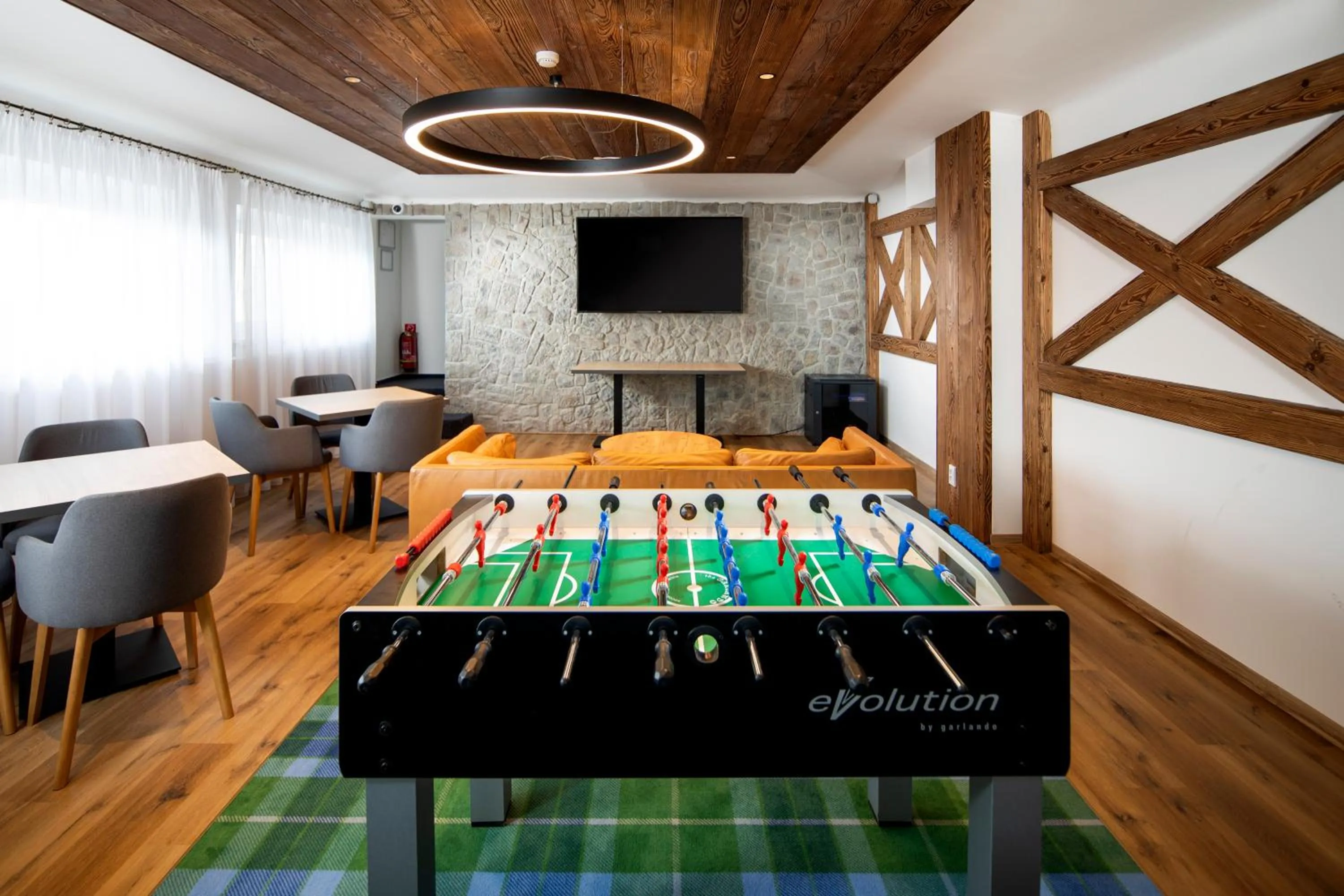 Communal lounge/ TV room in Hotel Granit Smrekovica