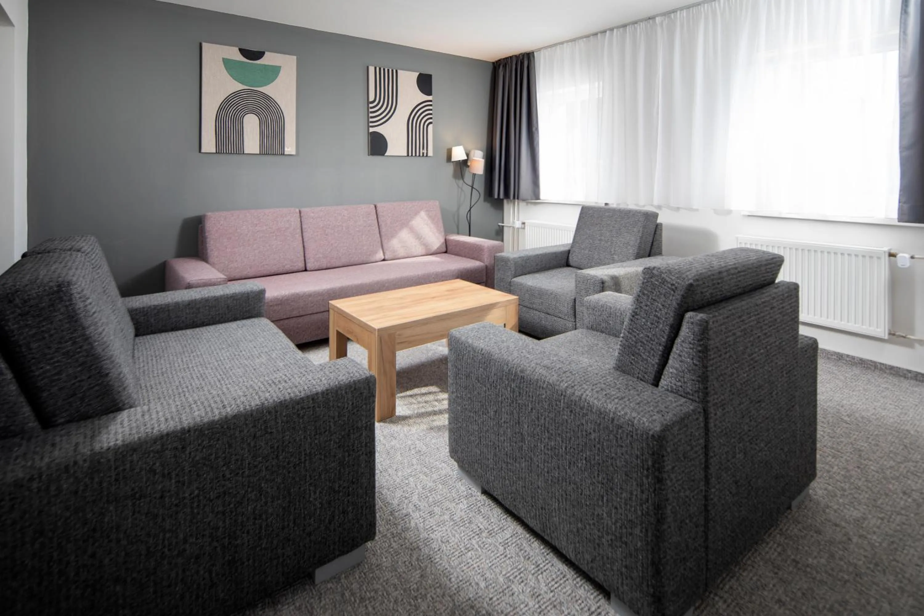 Communal lounge/ TV room in Hotel Granit Smrekovica