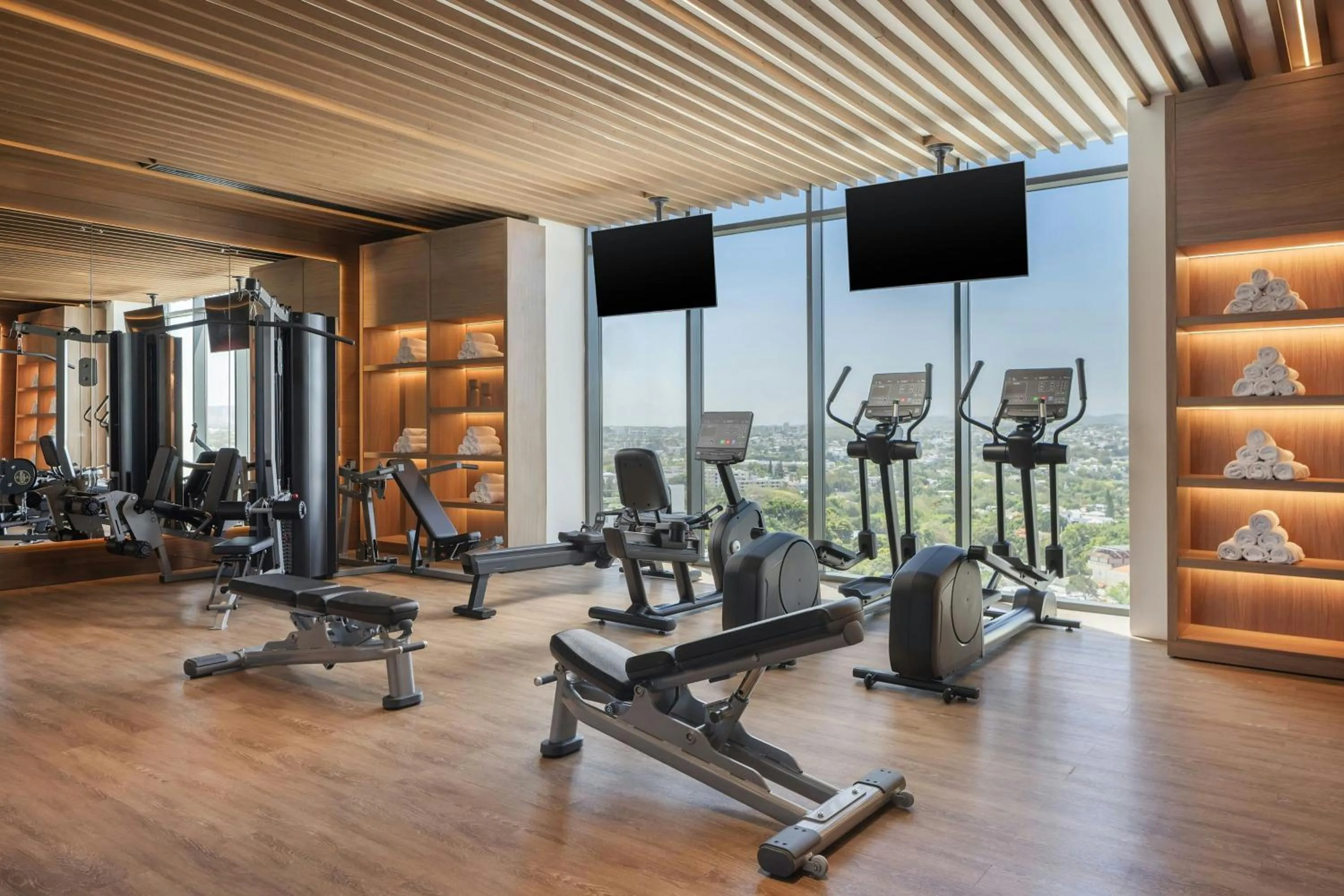 Fitness centre/facilities in AC Hotel by Marriott Santiago de los Caballeros