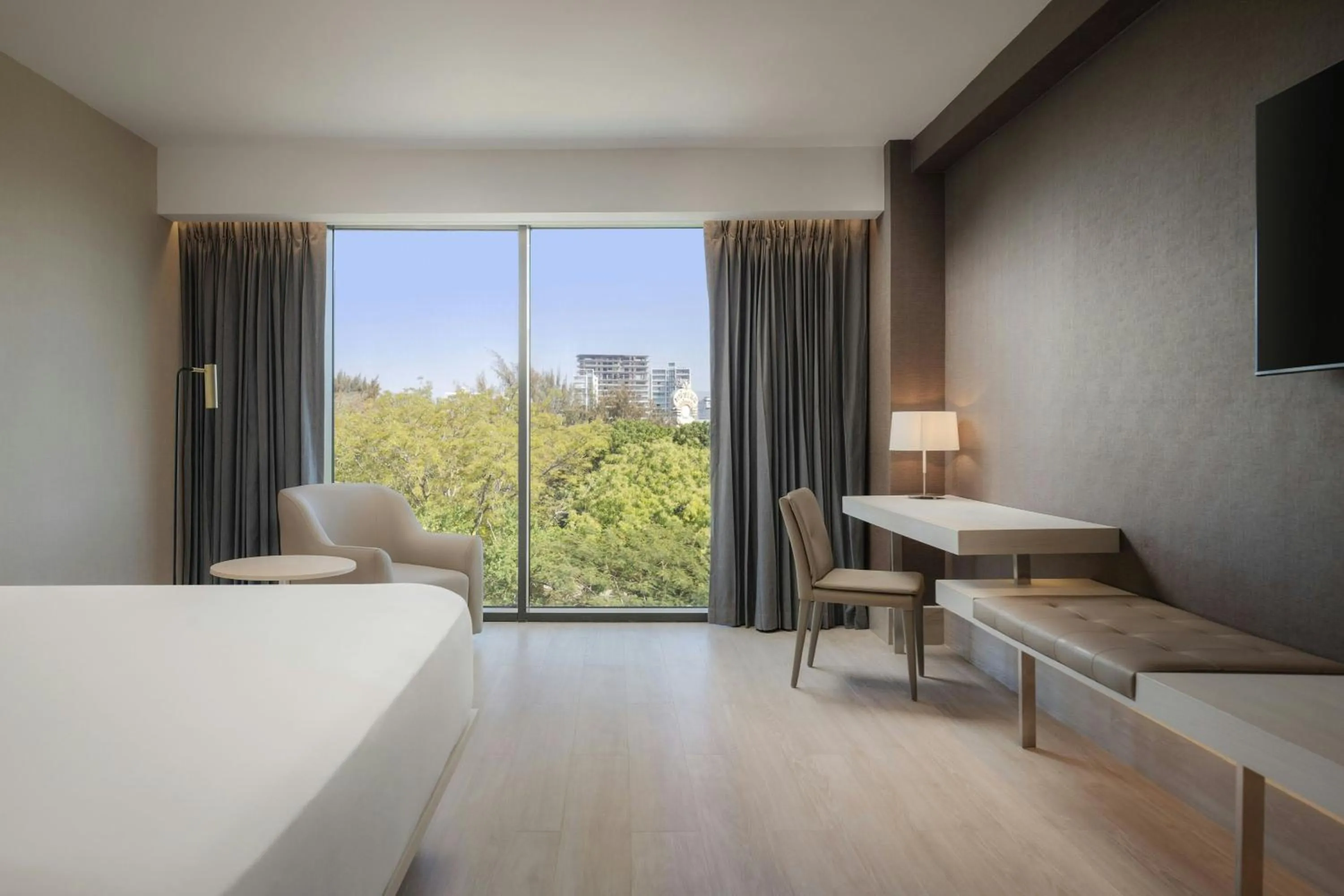 Photo of the whole room, Bed in AC Hotel by Marriott Santiago de los Caballeros