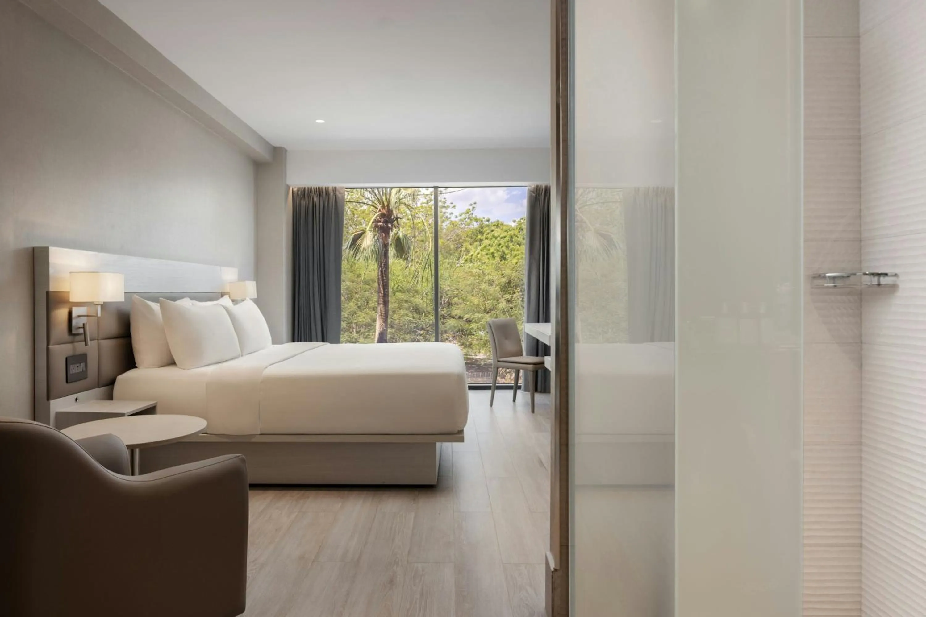 Photo of the whole room, Bed in AC Hotel by Marriott Santiago de los Caballeros