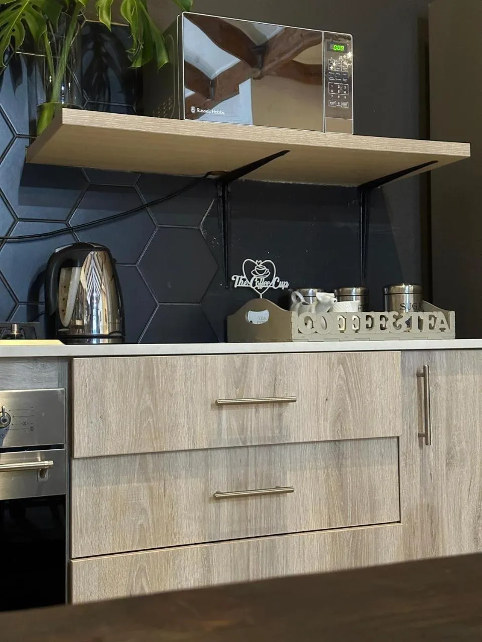 Kitchen or kitchenette in Sand River Guest House