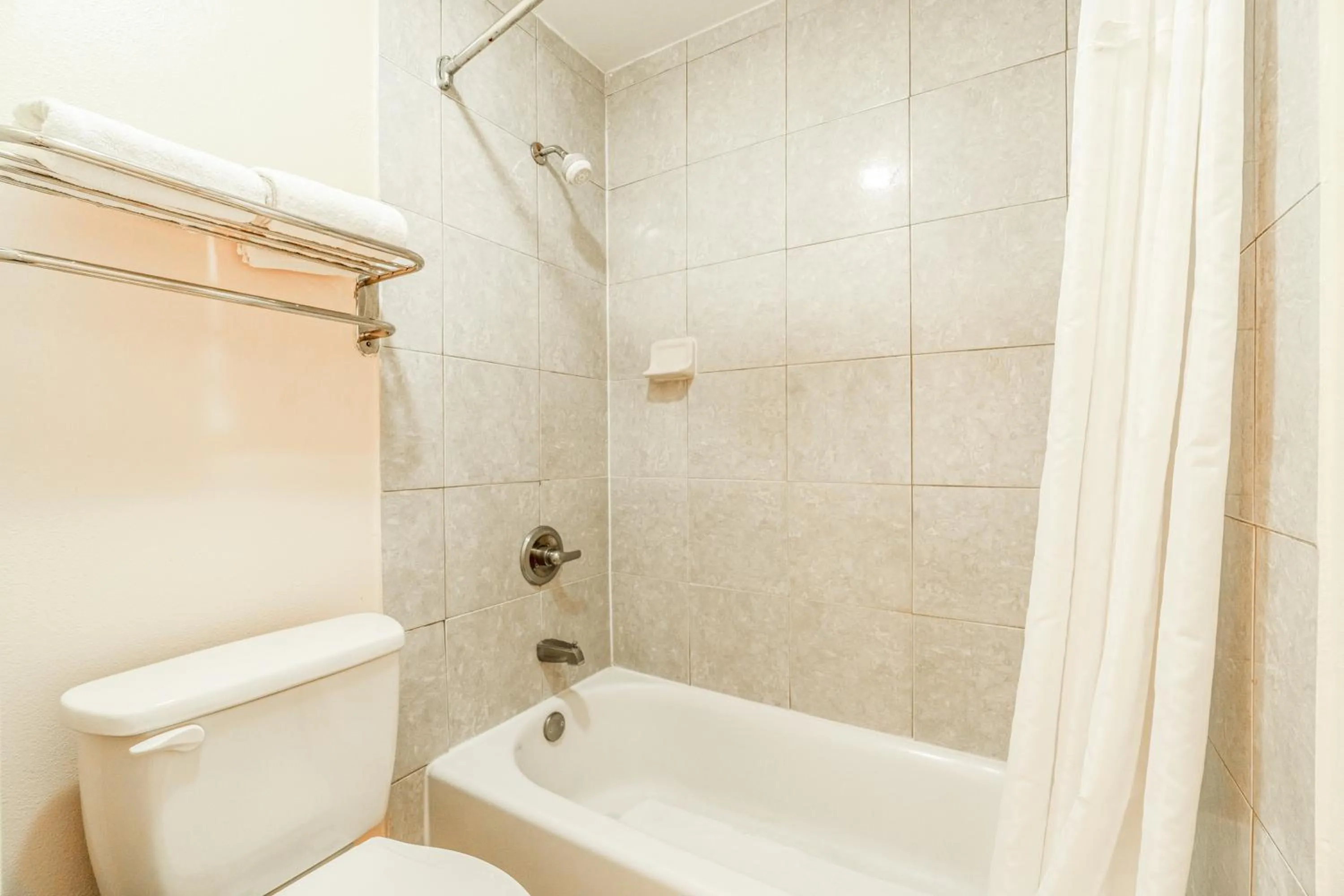 Bathroom in Shale Inn Andrews by OYO