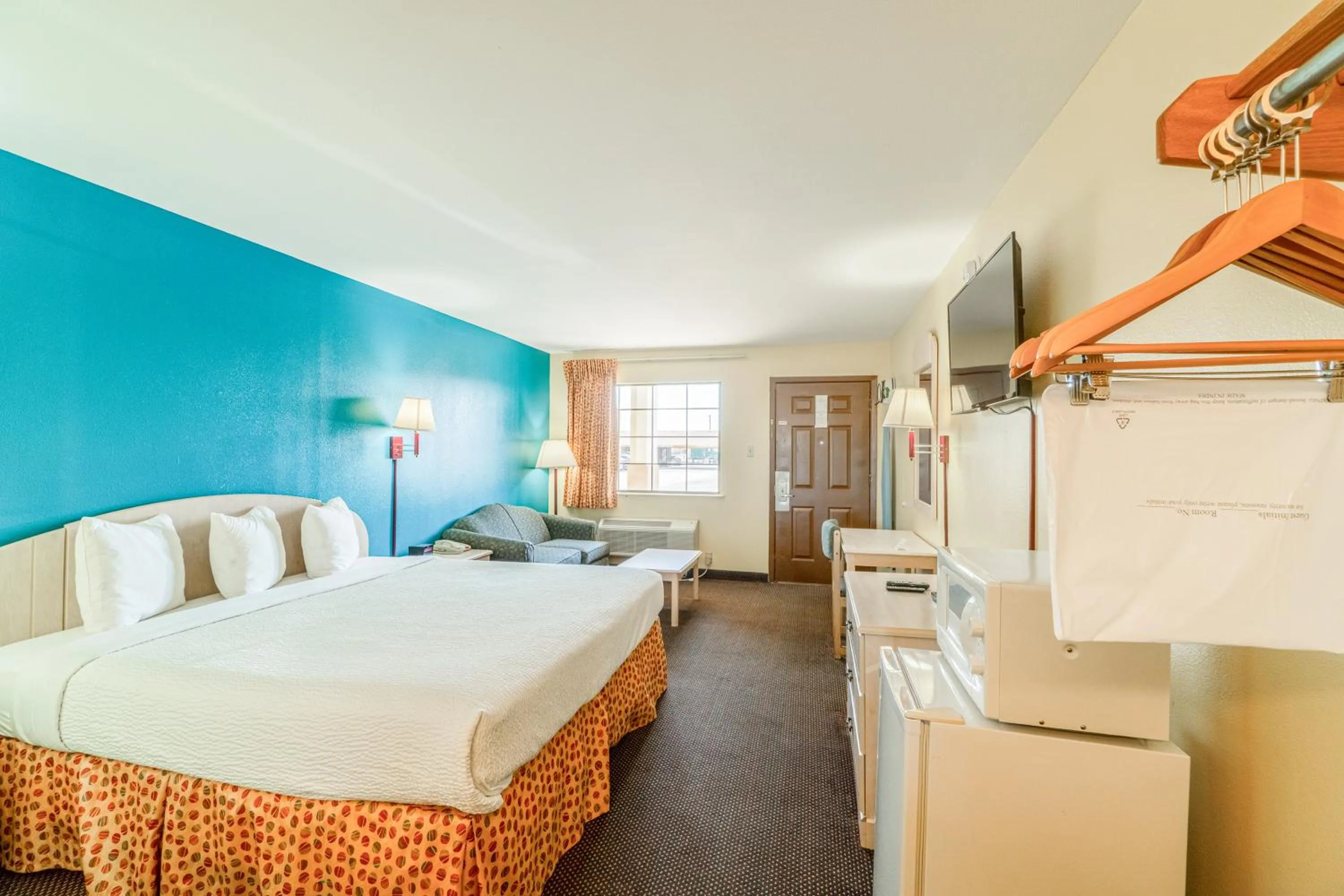 Bedroom, Bed in Shale Inn Andrews by OYO