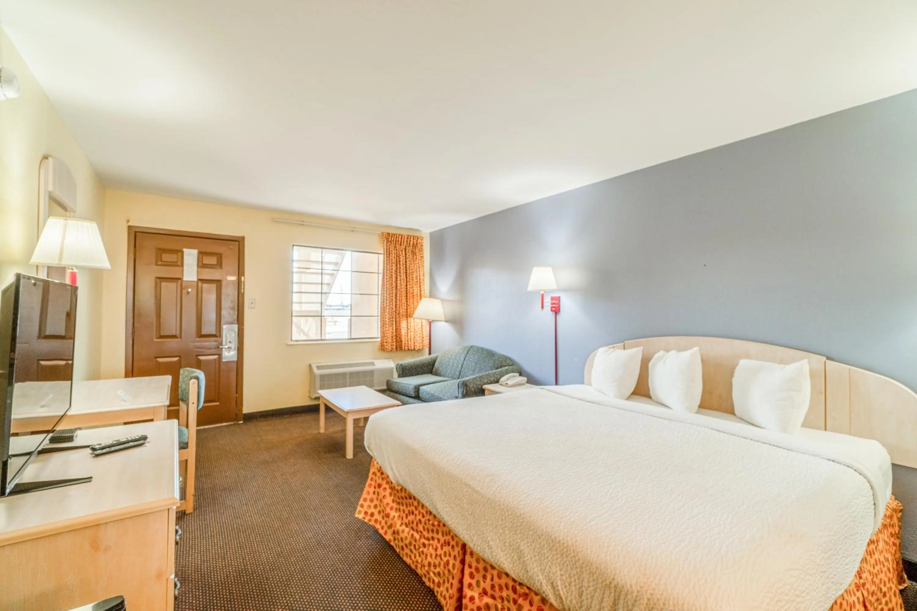 Bedroom, Bed in Shale Inn Andrews by OYO