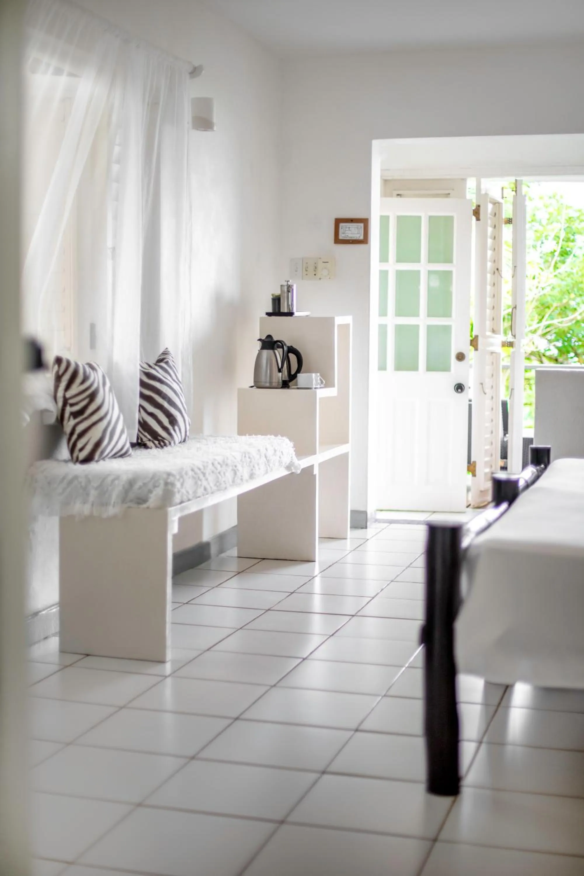 Seating area, Bed in LF Jungle Retreat