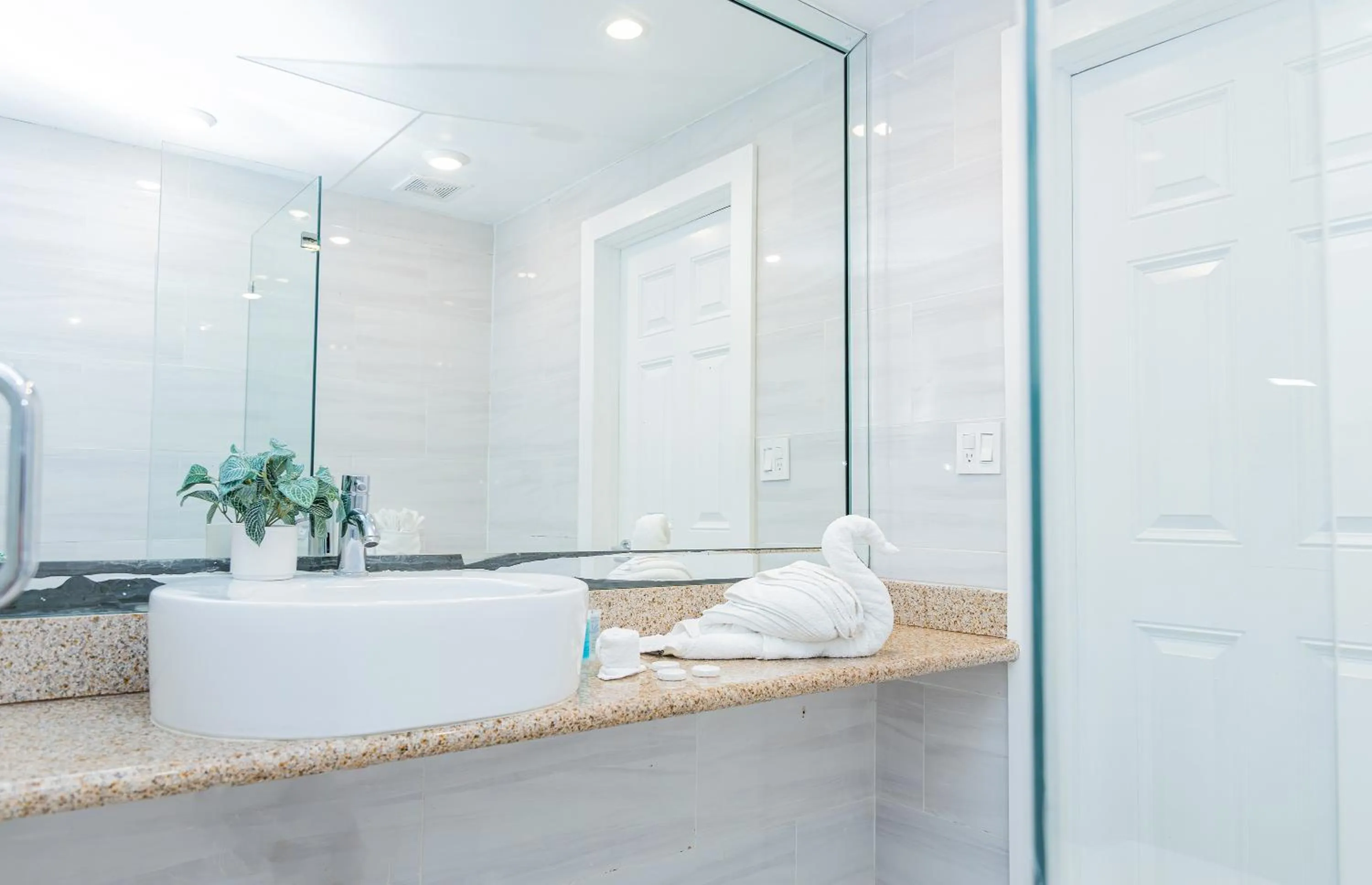 Bathroom in Beachside All Suites Hotel