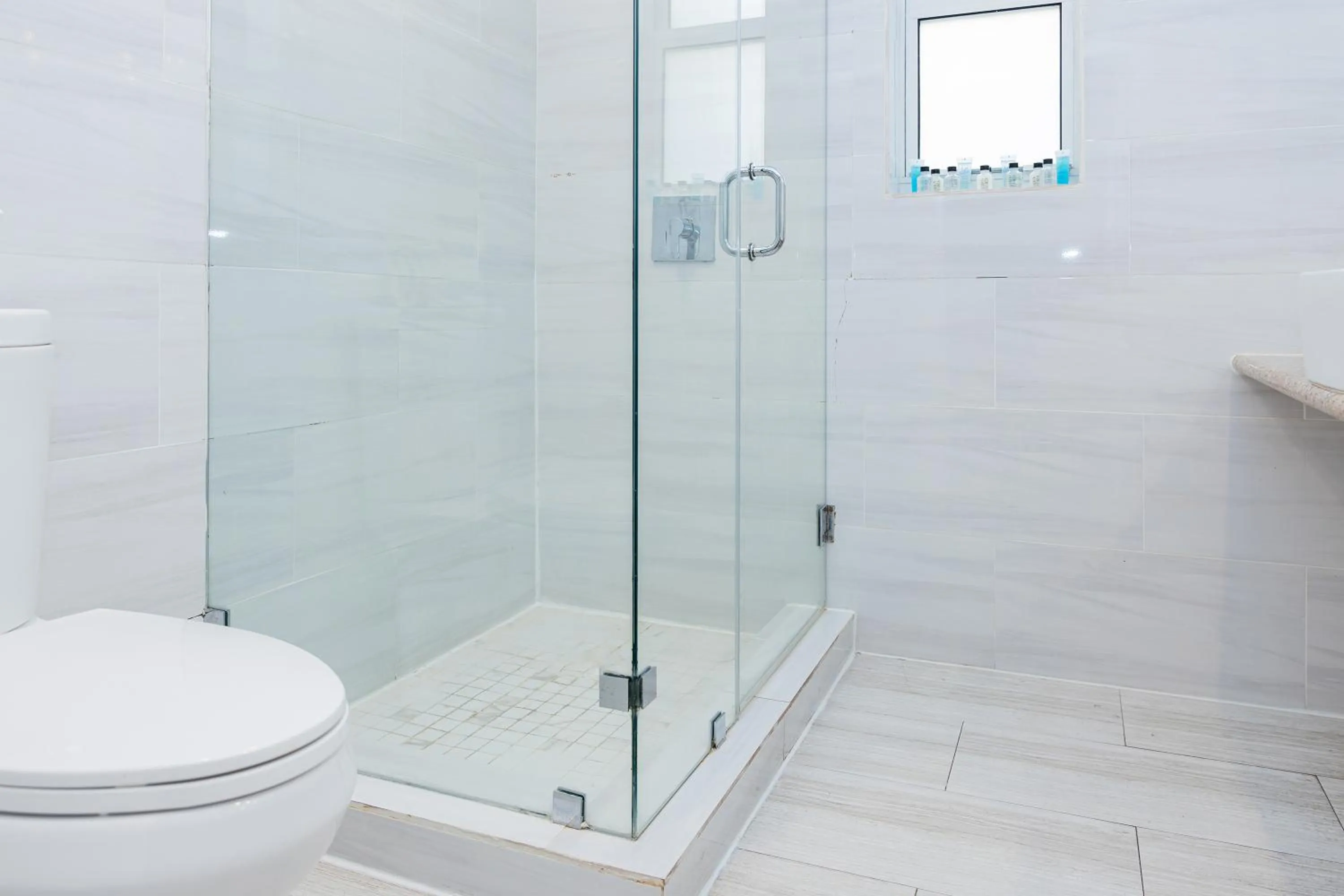 Bathroom in Beachside All Suites Hotel