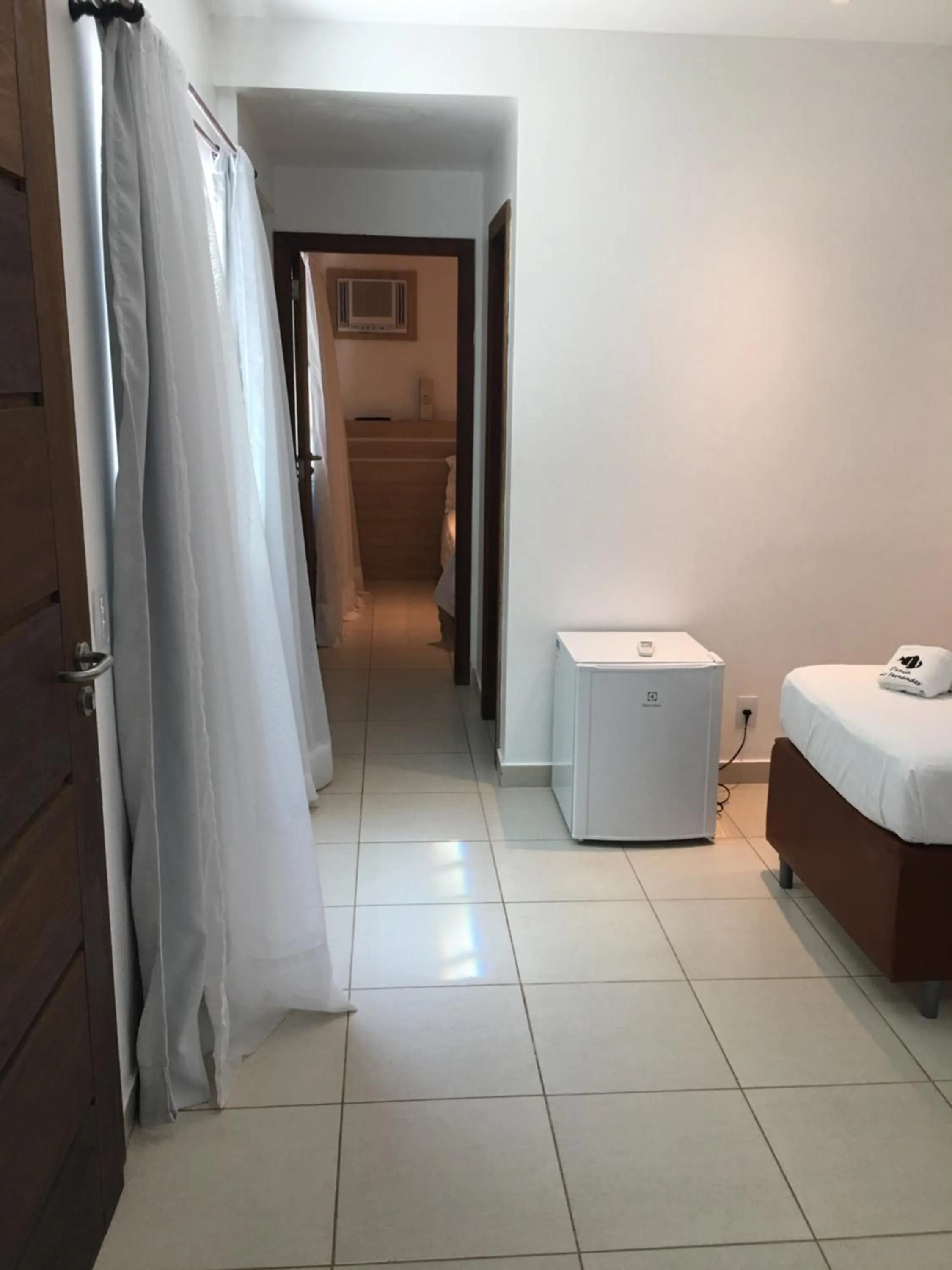 Bed in Pousada Praia João Fernandes